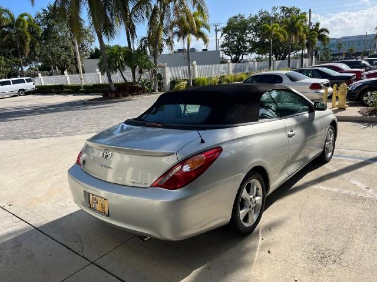 2005 Lunar Mist Metallic /Dark Charcoal Toyota Camry Solara SLE LOW MILES 34,834 (4T1FA38P15U) with an 3.3L DOHC SEFI VVT-i 24-Valve V6 Engine engine, Automatic transmission, located at 4701 North Dixie Hwy, Pompano Beach, FL, 33064, (954) 422-2889, 26.240938, -80.123474 - 2005 TOYOTA CAMRY SOLARA SLE V6 ROAD READY 3.3L V6 VIN: 4T1FA38P15U049746 LOW MILES 34,834 CONVERTIBLE FLORIDA OWNER 29 MPG 3.3L V6 F DOHC 24V SLE POWER CONVERTIBLE TOP GASOLINE NO RECALLS POWER LEATHER SEATS FRONT WHEEL DRIVE NO ACCIDENTS 14 SERVICE RECORDS Alloy Wheels Anti-Theft System Auto-dimmi - Photo#7