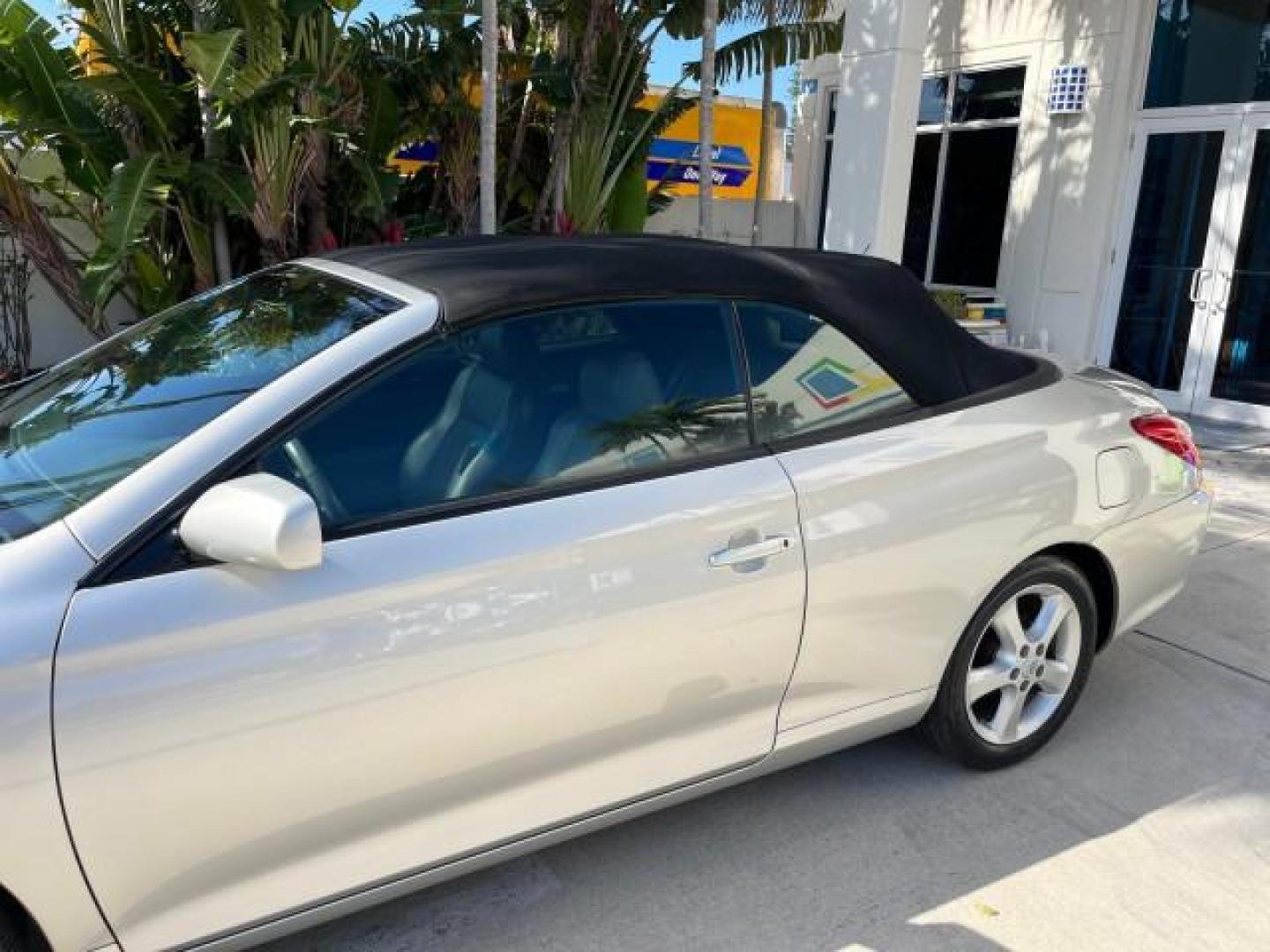 2005 Lunar Mist Metallic /Dark Charcoal Toyota Camry Solara SLE LOW MILES 34,834 (4T1FA38P15U) with an 3.3L DOHC SEFI VVT-i 24-Valve V6 Engine engine, Automatic transmission, located at 4701 North Dixie Hwy, Pompano Beach, FL, 33064, (954) 422-2889, 26.240938, -80.123474 - 2005 TOYOTA CAMRY SOLARA SLE V6 ROAD READY 3.3L V6 VIN: 4T1FA38P15U049746 LOW MILES 34,834 CONVERTIBLE FLORIDA OWNER 29 MPG 3.3L V6 F DOHC 24V SLE POWER CONVERTIBLE TOP GASOLINE NO RECALLS POWER LEATHER SEATS FRONT WHEEL DRIVE NO ACCIDENTS 14 SERVICE RECORDS Alloy Wheels Anti-Theft System Auto-dimmi - Photo#82