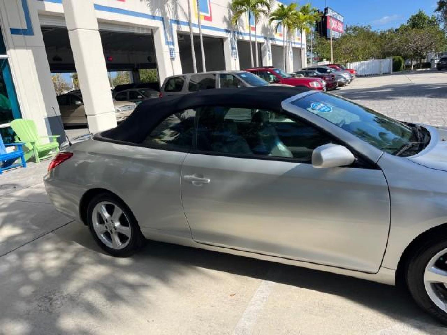 2005 Lunar Mist Metallic /Dark Charcoal Toyota Camry Solara SLE LOW MILES 34,834 (4T1FA38P15U) with an 3.3L DOHC SEFI VVT-i 24-Valve V6 Engine engine, Automatic transmission, located at 4701 North Dixie Hwy, Pompano Beach, FL, 33064, (954) 422-2889, 26.240938, -80.123474 - 2005 TOYOTA CAMRY SOLARA SLE V6 ROAD READY 3.3L V6 VIN: 4T1FA38P15U049746 LOW MILES 34,834 CONVERTIBLE FLORIDA OWNER 29 MPG 3.3L V6 F DOHC 24V SLE POWER CONVERTIBLE TOP GASOLINE NO RECALLS POWER LEATHER SEATS FRONT WHEEL DRIVE NO ACCIDENTS 14 SERVICE RECORDS Alloy Wheels Anti-Theft System Auto-dimmi - Photo#83