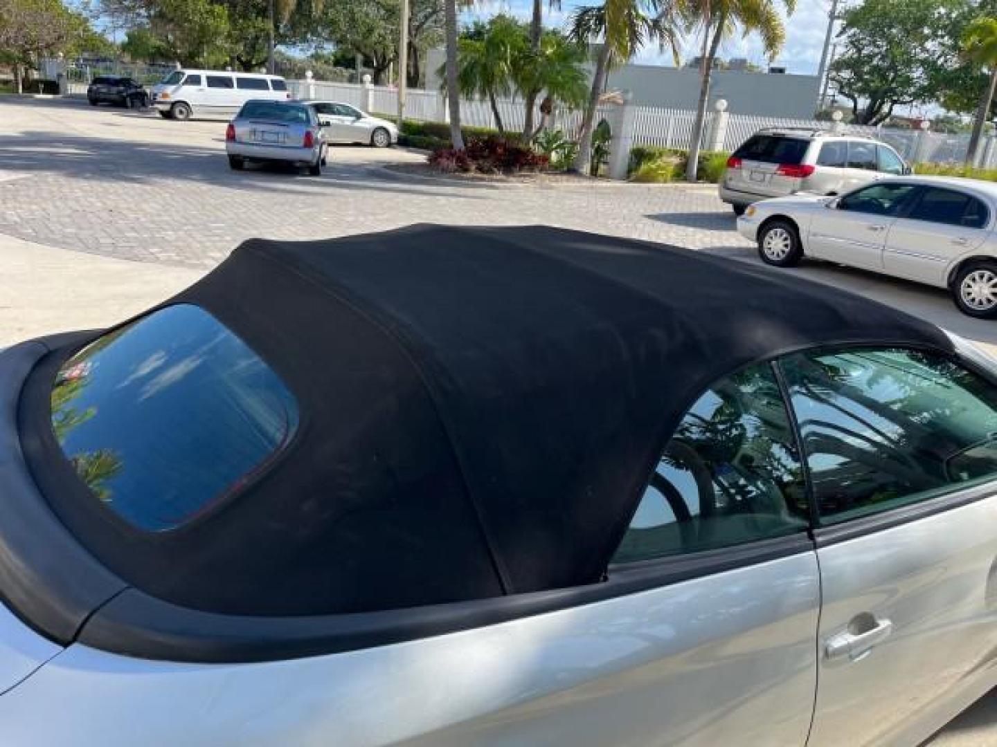 2005 Lunar Mist Metallic /Dark Charcoal Toyota Camry Solara SLE LOW MILES 34,834 (4T1FA38P15U) with an 3.3L DOHC SEFI VVT-i 24-Valve V6 Engine engine, Automatic transmission, located at 4701 North Dixie Hwy, Pompano Beach, FL, 33064, (954) 422-2889, 26.240938, -80.123474 - 2005 TOYOTA CAMRY SOLARA SLE V6 ROAD READY 3.3L V6 VIN: 4T1FA38P15U049746 LOW MILES 34,834 CONVERTIBLE FLORIDA OWNER 29 MPG 3.3L V6 F DOHC 24V SLE POWER CONVERTIBLE TOP GASOLINE NO RECALLS POWER LEATHER SEATS FRONT WHEEL DRIVE NO ACCIDENTS 14 SERVICE RECORDS Alloy Wheels Anti-Theft System Auto-dimmi - Photo#87