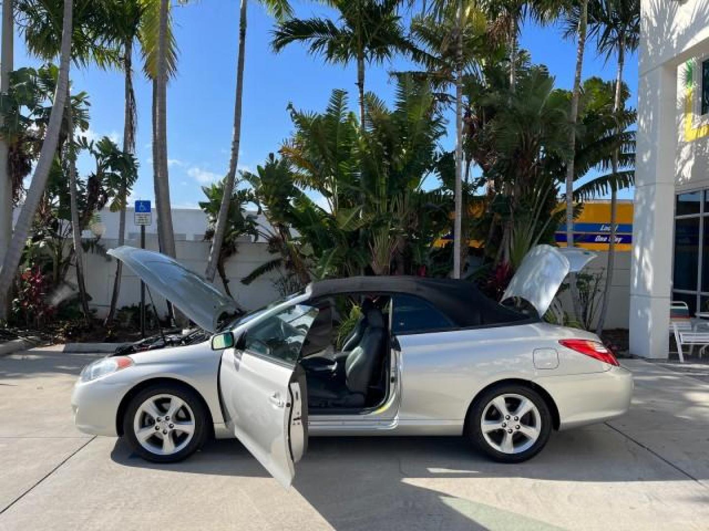 2005 Lunar Mist Metallic /Dark Charcoal Toyota Camry Solara SLE LOW MILES 34,834 (4T1FA38P15U) with an 3.3L DOHC SEFI VVT-i 24-Valve V6 Engine engine, Automatic transmission, located at 4701 North Dixie Hwy, Pompano Beach, FL, 33064, (954) 422-2889, 26.240938, -80.123474 - 2005 TOYOTA CAMRY SOLARA SLE V6 ROAD READY 3.3L V6 VIN: 4T1FA38P15U049746 LOW MILES 34,834 CONVERTIBLE FLORIDA OWNER 29 MPG 3.3L V6 F DOHC 24V SLE POWER CONVERTIBLE TOP GASOLINE NO RECALLS POWER LEATHER SEATS FRONT WHEEL DRIVE NO ACCIDENTS 14 SERVICE RECORDS Alloy Wheels Anti-Theft System Auto-dimmi - Photo#8