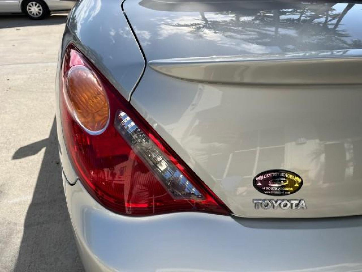 2005 Lunar Mist Metallic /Dark Charcoal Toyota Camry Solara SLE LOW MILES 34,834 (4T1FA38P15U) with an 3.3L DOHC SEFI VVT-i 24-Valve V6 Engine engine, Automatic transmission, located at 4701 North Dixie Hwy, Pompano Beach, FL, 33064, (954) 422-2889, 26.240938, -80.123474 - 2005 TOYOTA CAMRY SOLARA SLE V6 ROAD READY 3.3L V6 VIN: 4T1FA38P15U049746 LOW MILES 34,834 CONVERTIBLE FLORIDA OWNER 29 MPG 3.3L V6 F DOHC 24V SLE POWER CONVERTIBLE TOP GASOLINE NO RECALLS POWER LEATHER SEATS FRONT WHEEL DRIVE NO ACCIDENTS 14 SERVICE RECORDS Alloy Wheels Anti-Theft System Auto-dimmi - Photo#94