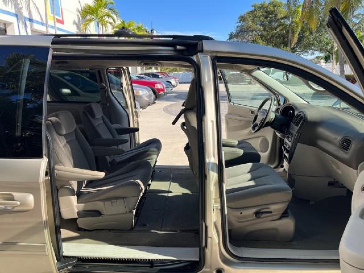 2005 Linen Gold Metallic Pearl /Medium Slate Gray Dodge Caravan SXT LOW MILES 60,664 (2D4GP44L95R) with an 3.8L SMPI V6 Engine engine, Automatic transmission, located at 4701 North Dixie Hwy, Pompano Beach, FL, 33064, (954) 422-2889, 26.240938, -80.123474 - 2005 DODGE GRAND CARAVAN SXT ROAD READY 3.8L V6 VIN: 2D4GP44L95R464538 LOW MILES 60,664 VAN NO ACCIDENTS NO RECALLS 3.8L V6 F FLORIDA OWNER GASOLINE 12 SERVICE RECORDS POWER SLIDING DOORS FRONT WHEEL DRIVE DUAL ZONE AC POWER SEATS/MIRRORS Additional Airbags Alloy Wheels Automatic Climate Control Bla - Photo#12