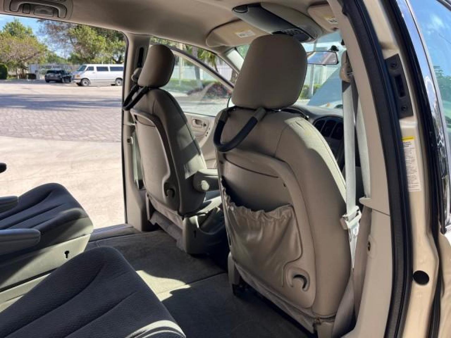 2005 Linen Gold Metallic Pearl /Medium Slate Gray Dodge Caravan SXT LOW MILES 60,664 (2D4GP44L95R) with an 3.8L SMPI V6 Engine engine, Automatic transmission, located at 4701 North Dixie Hwy, Pompano Beach, FL, 33064, (954) 422-2889, 26.240938, -80.123474 - 2005 DODGE GRAND CARAVAN SXT ROAD READY 3.8L V6 VIN: 2D4GP44L95R464538 LOW MILES 60,664 VAN NO ACCIDENTS NO RECALLS 3.8L V6 F FLORIDA OWNER GASOLINE 12 SERVICE RECORDS POWER SLIDING DOORS FRONT WHEEL DRIVE DUAL ZONE AC POWER SEATS/MIRRORS Additional Airbags Alloy Wheels Automatic Climate Control Bla - Photo#30