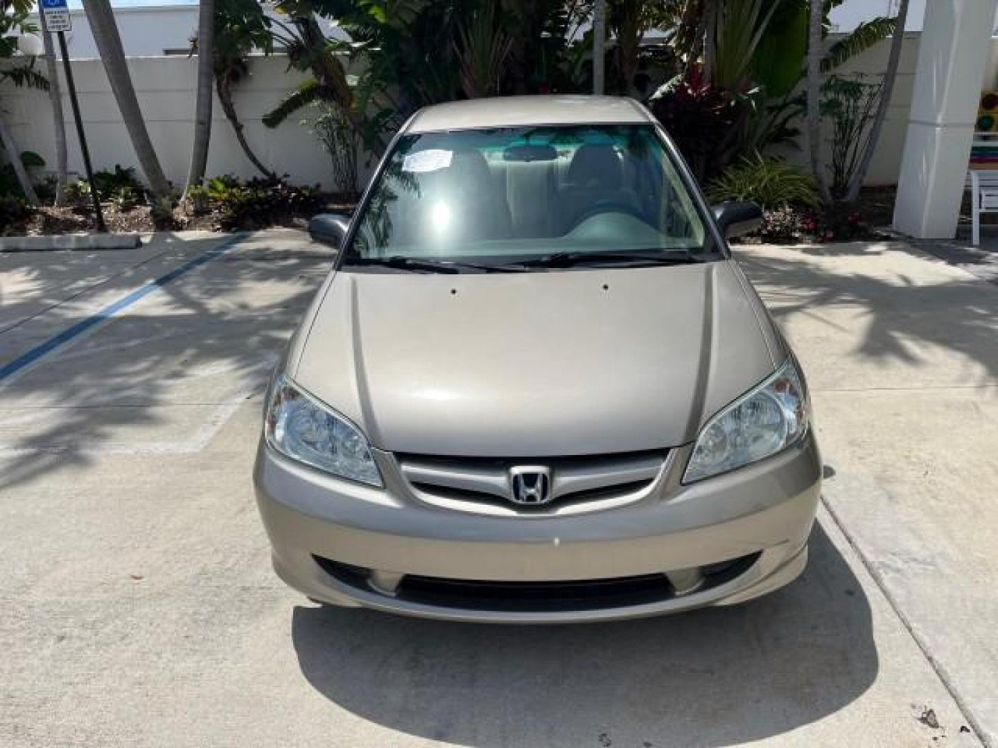 2004 Satin Silver Metallic /Gray Honda Civic LX LOW MILES 26,419 (2HGES165X4H) with an 1.7L SOHC MPFI 16-Valve I4 Engine engine, Automatic transmission, located at 4701 North Dixie Hwy, Pompano Beach, FL, 33064, (954) 422-2889, 26.240938, -80.123474 - 2004 HONDA CIVIC LX ROAD READY 1.7L I4 VIN: 2HGES165X4H591708 FLORIDA OWNER 38 MPG SEDAN 4 DR NO ACCIDENTS 1.7L I4 F SOHC 16V NO RECALLS GASOLINE POWER MIRRORS FRONT WHEEL DRIVE SUPER LOW MILES 26,419 Approach Lights Cruise Control FWD Front Bucket Seats THIS IS ONE OF THE NICEST HONDA S WE HAVE EVE - Photo#2