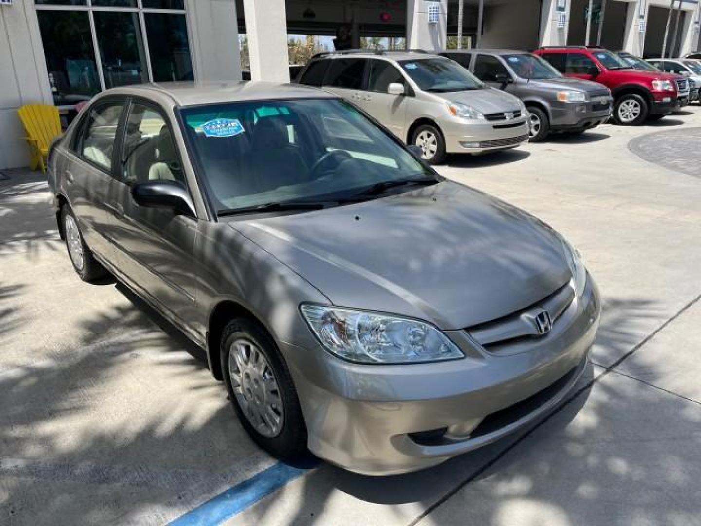 2004 Satin Silver Metallic /Gray Honda Civic LX LOW MILES 26,419 (2HGES165X4H) with an 1.7L SOHC MPFI 16-Valve I4 Engine engine, Automatic transmission, located at 4701 North Dixie Hwy, Pompano Beach, FL, 33064, (954) 422-2889, 26.240938, -80.123474 - 2004 HONDA CIVIC LX ROAD READY 1.7L I4 VIN: 2HGES165X4H591708 FLORIDA OWNER 38 MPG SEDAN 4 DR NO ACCIDENTS 1.7L I4 F SOHC 16V NO RECALLS GASOLINE POWER MIRRORS FRONT WHEEL DRIVE SUPER LOW MILES 26,419 Approach Lights Cruise Control FWD Front Bucket Seats THIS IS ONE OF THE NICEST HONDA S WE HAVE EVE - Photo#62