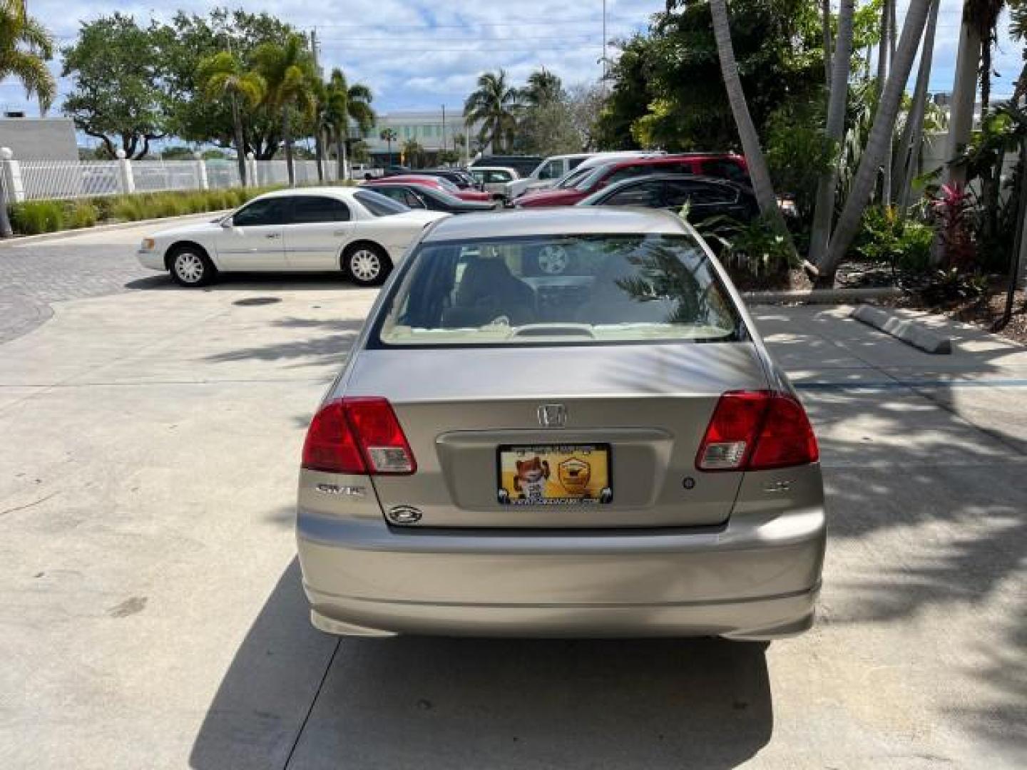 2004 Satin Silver Metallic /Gray Honda Civic LX LOW MILES 26,419 (2HGES165X4H) with an 1.7L SOHC MPFI 16-Valve I4 Engine engine, Automatic transmission, located at 4701 North Dixie Hwy, Pompano Beach, FL, 33064, (954) 422-2889, 26.240938, -80.123474 - 2004 HONDA CIVIC LX ROAD READY 1.7L I4 VIN: 2HGES165X4H591708 FLORIDA OWNER 38 MPG SEDAN 4 DR NO ACCIDENTS 1.7L I4 F SOHC 16V NO RECALLS GASOLINE POWER MIRRORS FRONT WHEEL DRIVE SUPER LOW MILES 26,419 Approach Lights Cruise Control FWD Front Bucket Seats THIS IS ONE OF THE NICEST HONDA S WE HAVE EVE - Photo#6