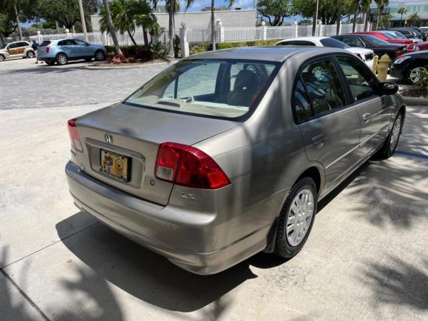 2004 Satin Silver Metallic /Gray Honda Civic LX LOW MILES 26,419 (2HGES165X4H) with an 1.7L SOHC MPFI 16-Valve I4 Engine engine, Automatic transmission, located at 4701 North Dixie Hwy, Pompano Beach, FL, 33064, (954) 422-2889, 26.240938, -80.123474 - 2004 HONDA CIVIC LX ROAD READY 1.7L I4 VIN: 2HGES165X4H591708 FLORIDA OWNER 38 MPG SEDAN 4 DR NO ACCIDENTS 1.7L I4 F SOHC 16V NO RECALLS GASOLINE POWER MIRRORS FRONT WHEEL DRIVE SUPER LOW MILES 26,419 Approach Lights Cruise Control FWD Front Bucket Seats THIS IS ONE OF THE NICEST HONDA S WE HAVE EVE - Photo#84