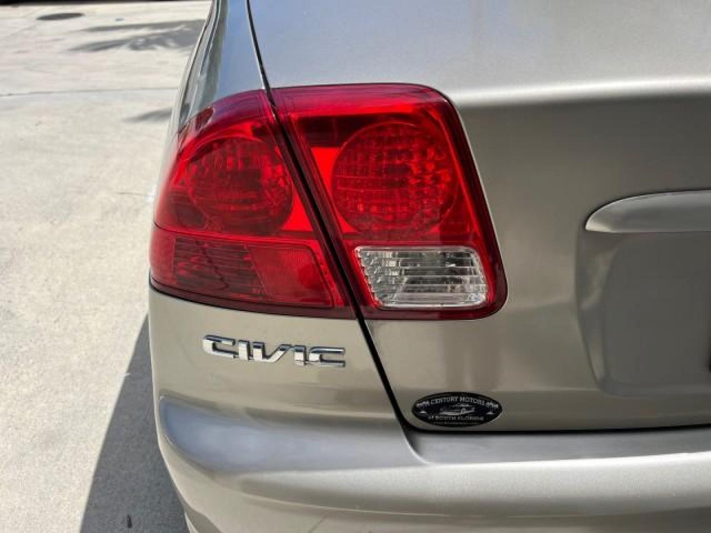 2004 Satin Silver Metallic /Gray Honda Civic LX LOW MILES 26,419 (2HGES165X4H) with an 1.7L SOHC MPFI 16-Valve I4 Engine engine, Automatic transmission, located at 4701 North Dixie Hwy, Pompano Beach, FL, 33064, (954) 422-2889, 26.240938, -80.123474 - 2004 HONDA CIVIC LX ROAD READY 1.7L I4 VIN: 2HGES165X4H591708 FLORIDA OWNER 38 MPG SEDAN 4 DR NO ACCIDENTS 1.7L I4 F SOHC 16V NO RECALLS GASOLINE POWER MIRRORS FRONT WHEEL DRIVE SUPER LOW MILES 26,419 Approach Lights Cruise Control FWD Front Bucket Seats THIS IS ONE OF THE NICEST HONDA S WE HAVE EVE - Photo#86