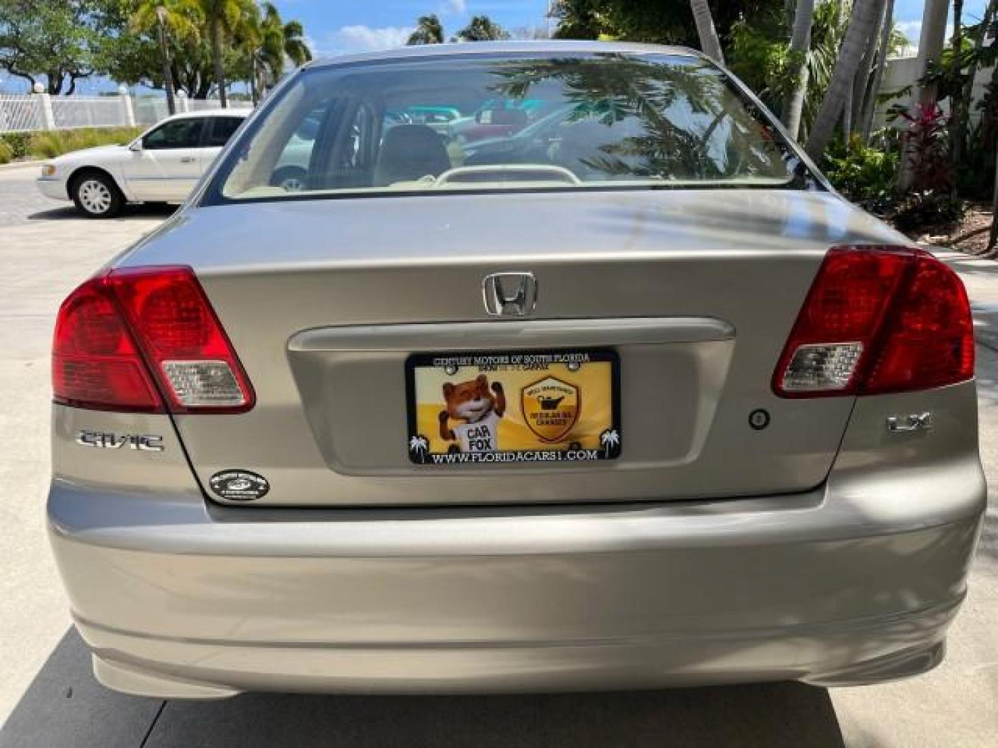 2004 Satin Silver Metallic /Gray Honda Civic LX LOW MILES 26,419 (2HGES165X4H) with an 1.7L SOHC MPFI 16-Valve I4 Engine engine, Automatic transmission, located at 4701 North Dixie Hwy, Pompano Beach, FL, 33064, (954) 422-2889, 26.240938, -80.123474 - 2004 HONDA CIVIC LX ROAD READY 1.7L I4 VIN: 2HGES165X4H591708 FLORIDA OWNER 38 MPG SEDAN 4 DR NO ACCIDENTS 1.7L I4 F SOHC 16V NO RECALLS GASOLINE POWER MIRRORS FRONT WHEEL DRIVE SUPER LOW MILES 26,419 Approach Lights Cruise Control FWD Front Bucket Seats THIS IS ONE OF THE NICEST HONDA S WE HAVE EVE - Photo#87