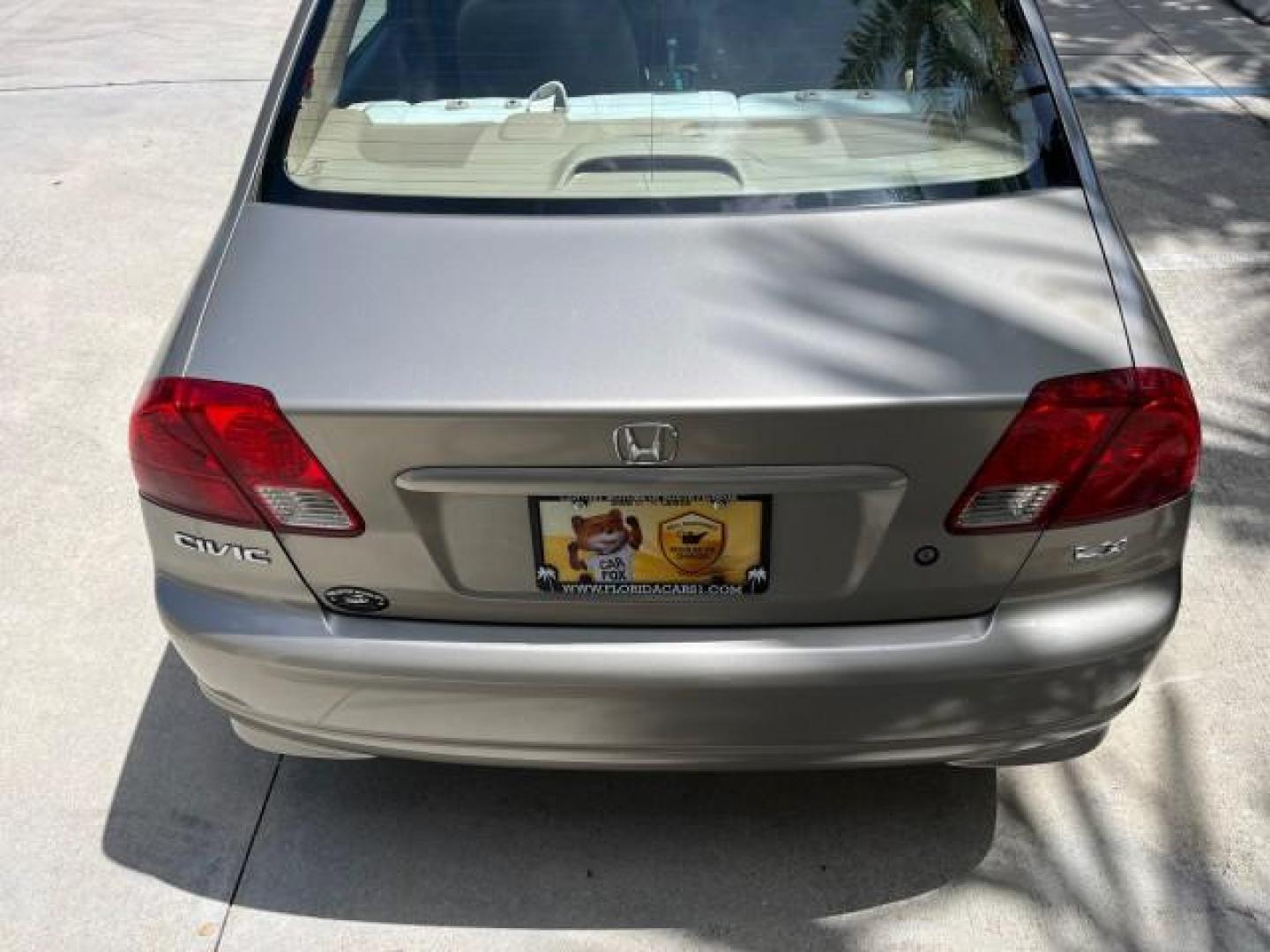 2004 Satin Silver Metallic /Gray Honda Civic LX LOW MILES 26,419 (2HGES165X4H) with an 1.7L SOHC MPFI 16-Valve I4 Engine engine, Automatic transmission, located at 4701 North Dixie Hwy, Pompano Beach, FL, 33064, (954) 422-2889, 26.240938, -80.123474 - 2004 HONDA CIVIC LX ROAD READY 1.7L I4 VIN: 2HGES165X4H591708 FLORIDA OWNER 38 MPG SEDAN 4 DR NO ACCIDENTS 1.7L I4 F SOHC 16V NO RECALLS GASOLINE POWER MIRRORS FRONT WHEEL DRIVE SUPER LOW MILES 26,419 Approach Lights Cruise Control FWD Front Bucket Seats THIS IS ONE OF THE NICEST HONDA S WE HAVE EVE - Photo#89