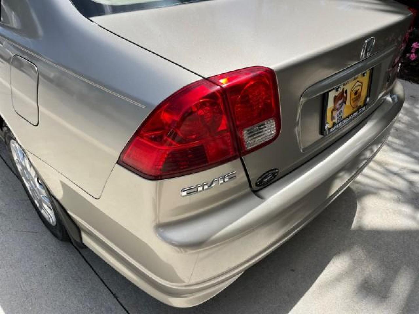 2004 Satin Silver Metallic /Gray Honda Civic LX LOW MILES 26,419 (2HGES165X4H) with an 1.7L SOHC MPFI 16-Valve I4 Engine engine, Automatic transmission, located at 4701 North Dixie Hwy, Pompano Beach, FL, 33064, (954) 422-2889, 26.240938, -80.123474 - 2004 HONDA CIVIC LX ROAD READY 1.7L I4 VIN: 2HGES165X4H591708 FLORIDA OWNER 38 MPG SEDAN 4 DR NO ACCIDENTS 1.7L I4 F SOHC 16V NO RECALLS GASOLINE POWER MIRRORS FRONT WHEEL DRIVE SUPER LOW MILES 26,419 Approach Lights Cruise Control FWD Front Bucket Seats THIS IS ONE OF THE NICEST HONDA S WE HAVE EVE - Photo#91