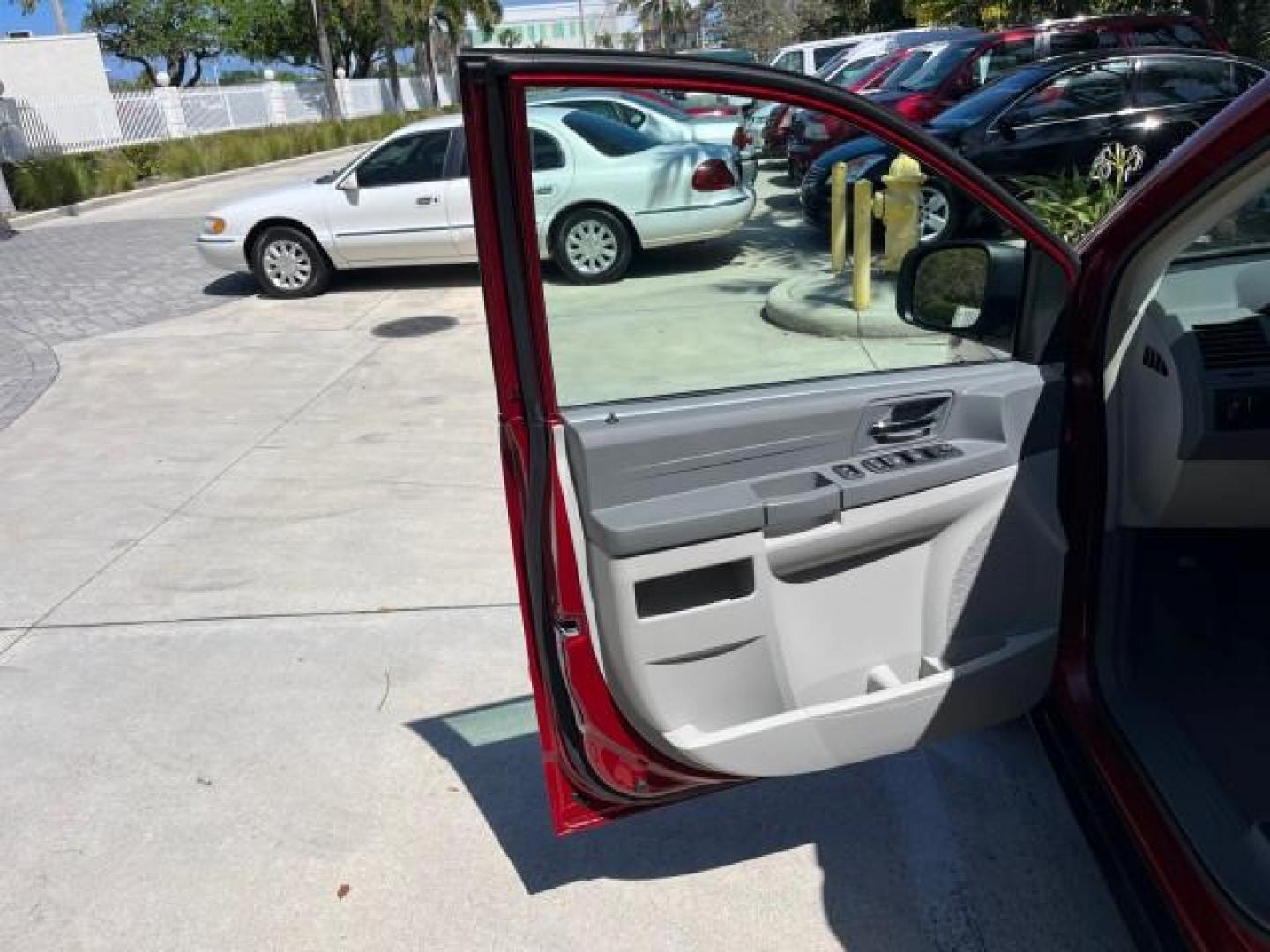 2009 Inferno Red Crystal Pearl /Md Slate Gray/Lt Shale Chrysler Town and Country 1 FL LX LOW MILES 41,724 (2A8HR44E49R) with an 3.3L OHV SMPI V6 Engine engine, Automatic transmission, located at 4701 North Dixie Hwy, Pompano Beach, FL, 33064, (954) 422-2889, 26.240938, -80.123474 - 2009 CHRYSLER TOWN AND COUNTRY LX ROAD READY 3.3L V6 VIN: 2A8HR44E49R573131 LOW MILES 41,724 VAN NO ACCIDENTS 3.3L V6 F OHV 12V POWER SEATS/MIRRORS NO RECALLS GASOLINE POWER LIFTGATE FLORIDA 1 OWNER FRONT WHEEL DRIVE POWER SLIDING DOORS 3 ROW SEATS Anti-Theft System Approach Lights Braking Assist Cr - Photo#9