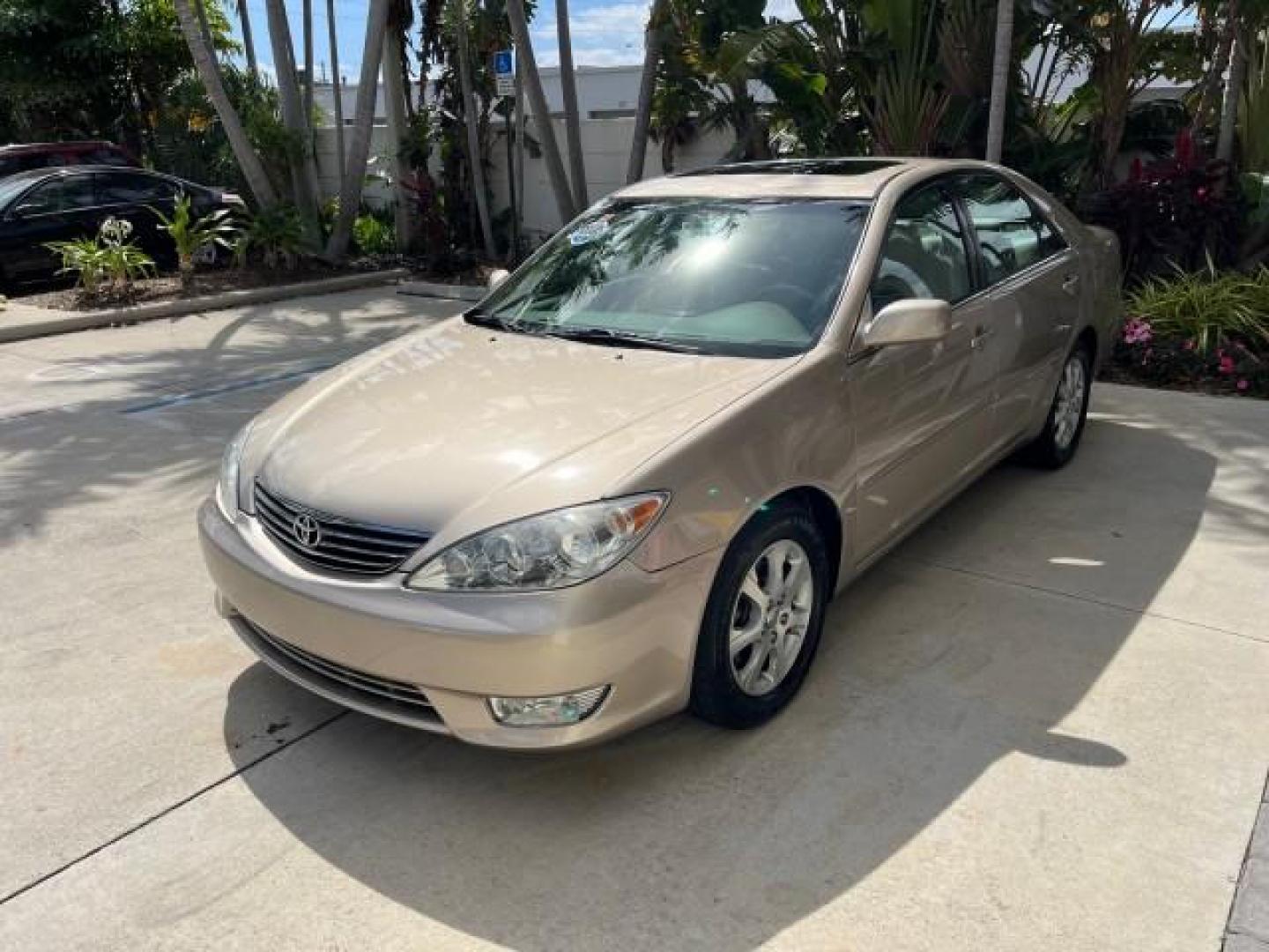 2005 Desert Sand Mica /Taupe Toyota Camry XLE LOW MILES 61,434 (4T1BF30K35U) with an 3.0L DOHC MPFI Vvti 24-Valve V6 Engine engine, Automatic transmission, located at 4701 North Dixie Hwy, Pompano Beach, FL, 33064, (954) 422-2889, 26.240938, -80.123474 - 2005 TOYOTA CAMRY XLE V6 ROAD READY 3.0L V6 VIN: 4T1BF30K35U595917 NO RECALLS 28 MPG SEDAN 4 DR POWER LEATHER SEATS 3.0L V6 F DOHC 24V POWER SUNROOF XLE GASOLINE 32 SERVICE RECORDS FRONT WHEEL DRIVE 1 OWNER LOW MILES 61,434 Alloy Wheels Anti-Theft System Auto-dimming Rearview Mirror Automatic Climat - Photo#3