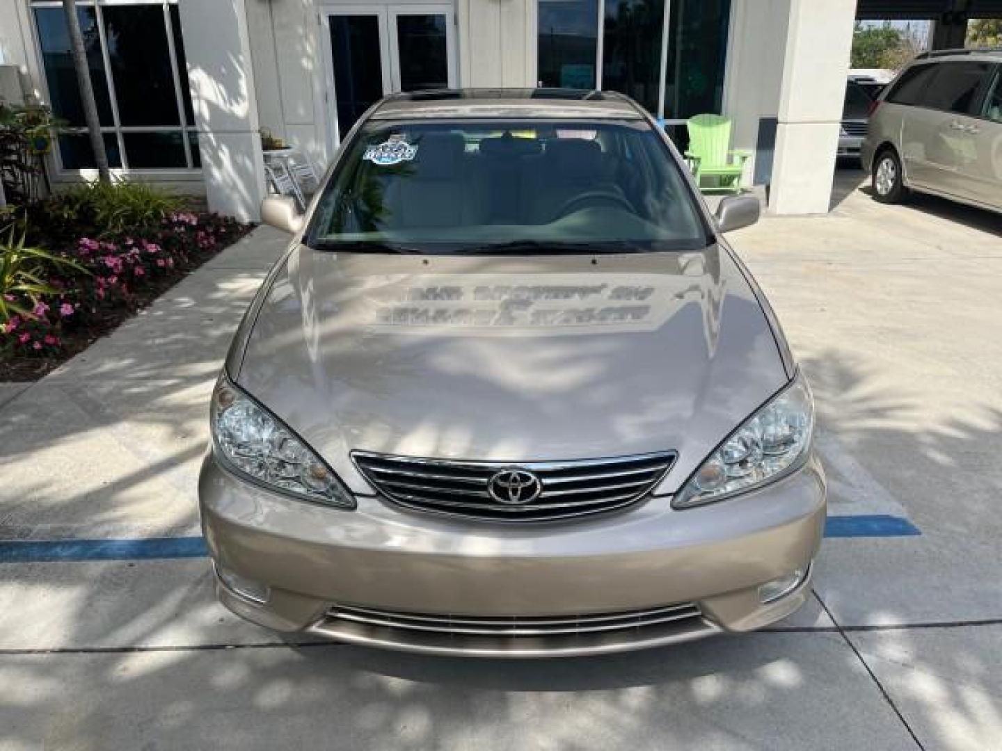 2005 Desert Sand Mica /Taupe Toyota Camry XLE LOW MILES 61,434 (4T1BF30K35U) with an 3.0L DOHC MPFI Vvti 24-Valve V6 Engine engine, Automatic transmission, located at 4701 North Dixie Hwy, Pompano Beach, FL, 33064, (954) 422-2889, 26.240938, -80.123474 - 2005 TOYOTA CAMRY XLE V6 ROAD READY 3.0L V6 VIN: 4T1BF30K35U595917 NO RECALLS 28 MPG SEDAN 4 DR POWER LEATHER SEATS 3.0L V6 F DOHC 24V POWER SUNROOF XLE GASOLINE 32 SERVICE RECORDS FRONT WHEEL DRIVE 1 OWNER LOW MILES 61,434 Alloy Wheels Anti-Theft System Auto-dimming Rearview Mirror Automatic Climat - Photo#78