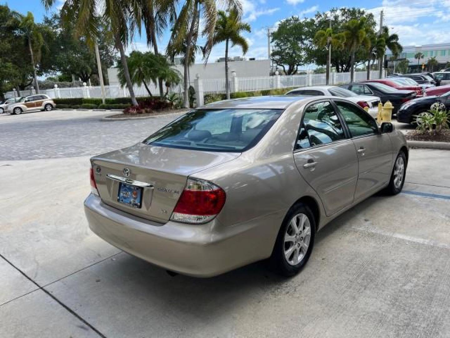 2005 Desert Sand Mica /Taupe Toyota Camry XLE LOW MILES 61,434 (4T1BF30K35U) with an 3.0L DOHC MPFI Vvti 24-Valve V6 Engine engine, Automatic transmission, located at 4701 North Dixie Hwy, Pompano Beach, FL, 33064, (954) 422-2889, 26.240938, -80.123474 - 2005 TOYOTA CAMRY XLE V6 ROAD READY 3.0L V6 VIN: 4T1BF30K35U595917 NO RECALLS 28 MPG SEDAN 4 DR POWER LEATHER SEATS 3.0L V6 F DOHC 24V POWER SUNROOF XLE GASOLINE 32 SERVICE RECORDS FRONT WHEEL DRIVE 1 OWNER LOW MILES 61,434 Alloy Wheels Anti-Theft System Auto-dimming Rearview Mirror Automatic Climat - Photo#7