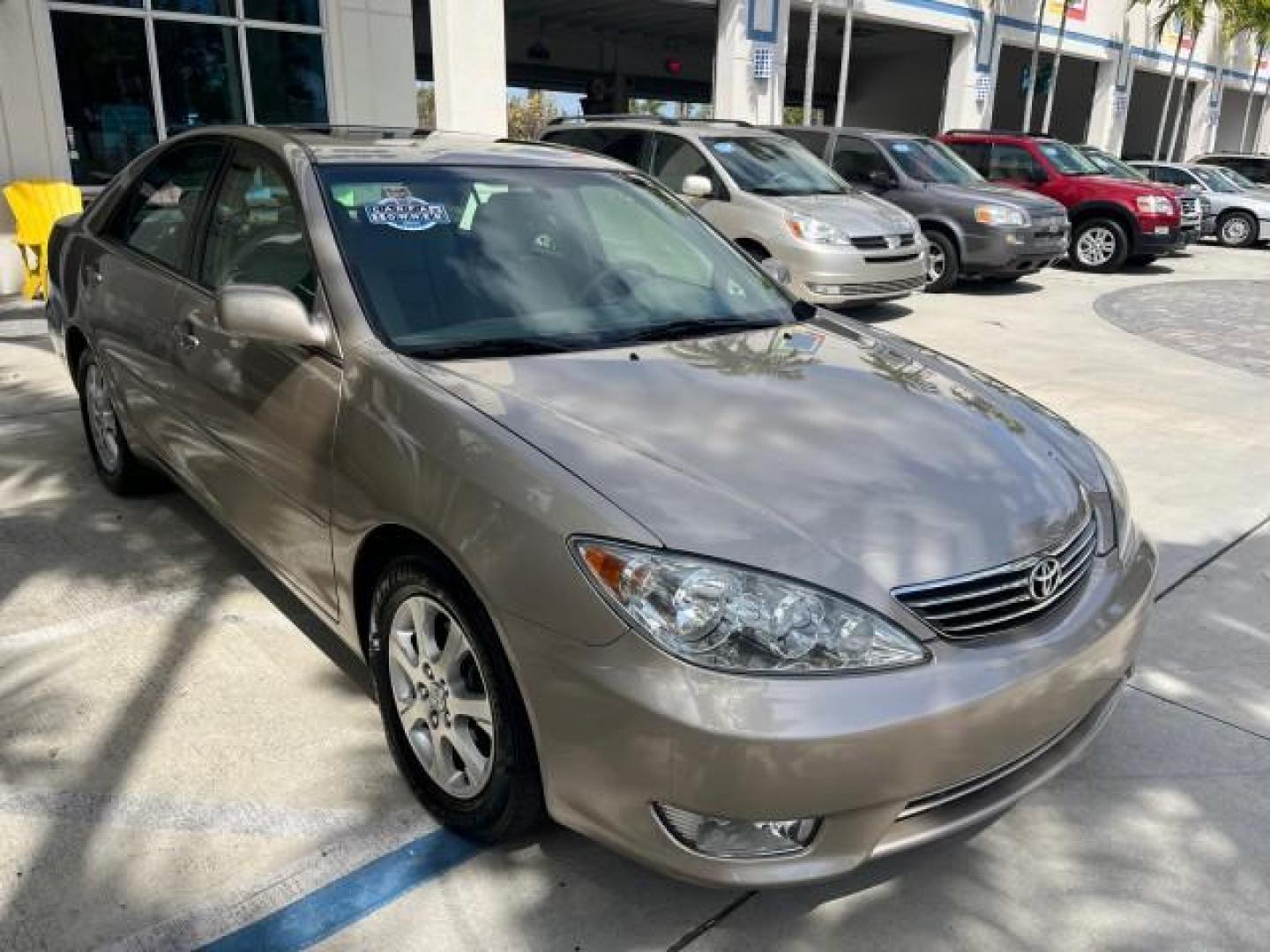 2005 Desert Sand Mica /Taupe Toyota Camry XLE LOW MILES 61,434 (4T1BF30K35U) with an 3.0L DOHC MPFI Vvti 24-Valve V6 Engine engine, Automatic transmission, located at 4701 North Dixie Hwy, Pompano Beach, FL, 33064, (954) 422-2889, 26.240938, -80.123474 - 2005 TOYOTA CAMRY XLE V6 ROAD READY 3.0L V6 VIN: 4T1BF30K35U595917 NO RECALLS 28 MPG SEDAN 4 DR POWER LEATHER SEATS 3.0L V6 F DOHC 24V POWER SUNROOF XLE GASOLINE 32 SERVICE RECORDS FRONT WHEEL DRIVE 1 OWNER LOW MILES 61,434 Alloy Wheels Anti-Theft System Auto-dimming Rearview Mirror Automatic Climat - Photo#79