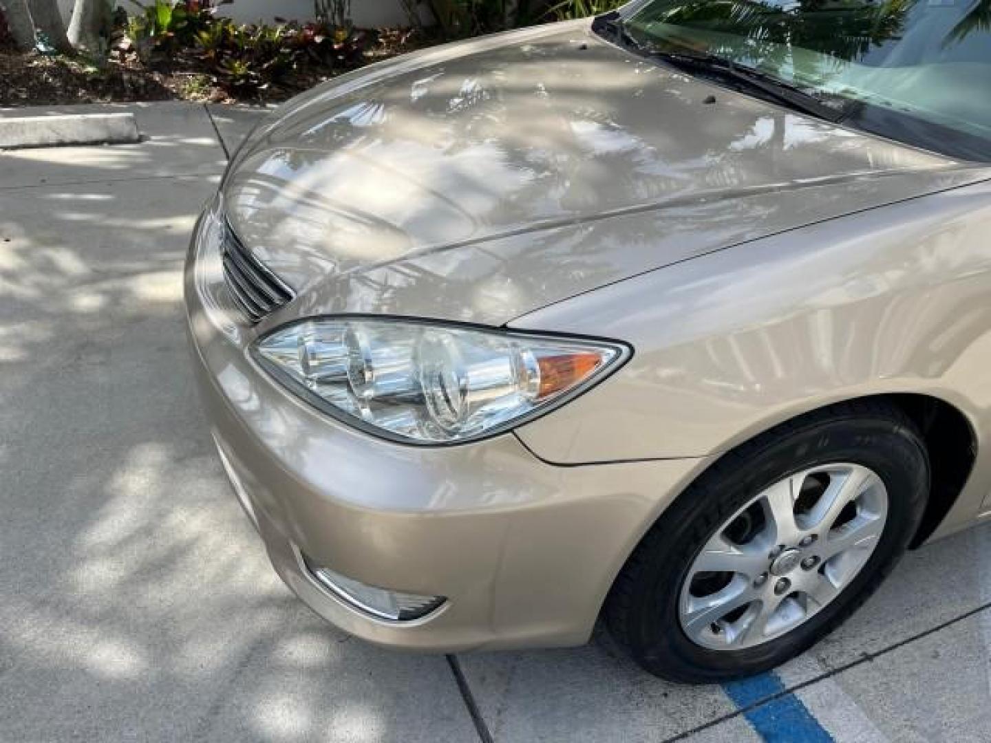 2005 Desert Sand Mica /Taupe Toyota Camry XLE LOW MILES 61,434 (4T1BF30K35U) with an 3.0L DOHC MPFI Vvti 24-Valve V6 Engine engine, Automatic transmission, located at 4701 North Dixie Hwy, Pompano Beach, FL, 33064, (954) 422-2889, 26.240938, -80.123474 - 2005 TOYOTA CAMRY XLE V6 ROAD READY 3.0L V6 VIN: 4T1BF30K35U595917 NO RECALLS 28 MPG SEDAN 4 DR POWER LEATHER SEATS 3.0L V6 F DOHC 24V POWER SUNROOF XLE GASOLINE 32 SERVICE RECORDS FRONT WHEEL DRIVE 1 OWNER LOW MILES 61,434 Alloy Wheels Anti-Theft System Auto-dimming Rearview Mirror Automatic Climat - Photo#86