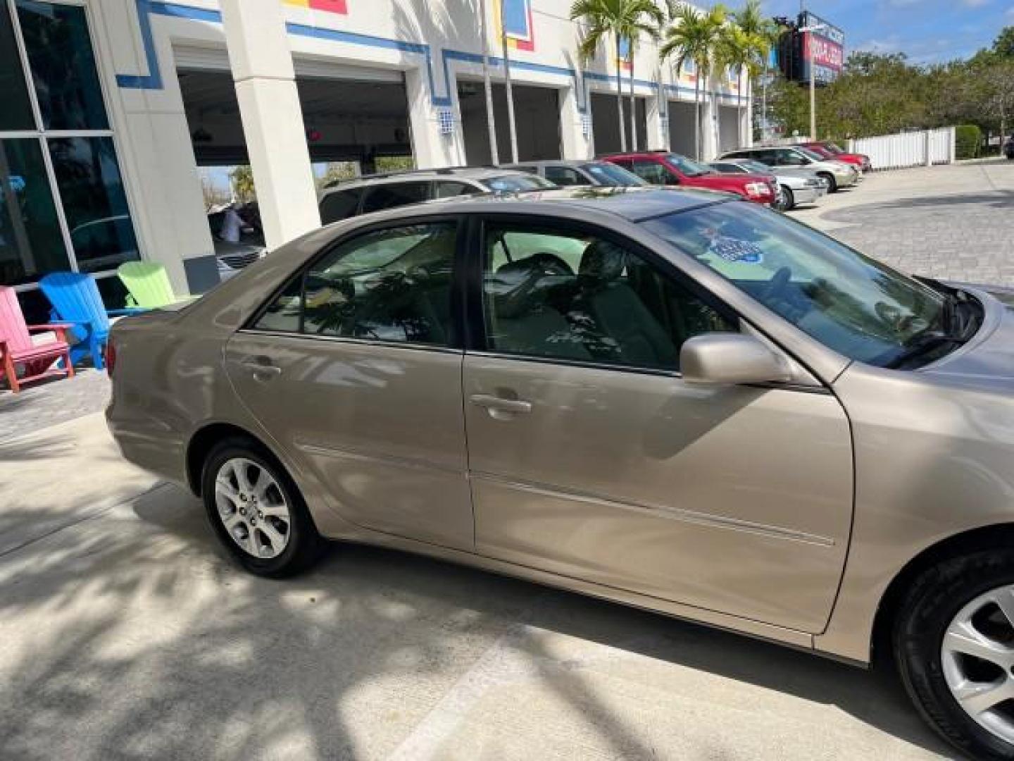 2005 Desert Sand Mica /Taupe Toyota Camry XLE LOW MILES 61,434 (4T1BF30K35U) with an 3.0L DOHC MPFI Vvti 24-Valve V6 Engine engine, Automatic transmission, located at 4701 North Dixie Hwy, Pompano Beach, FL, 33064, (954) 422-2889, 26.240938, -80.123474 - 2005 TOYOTA CAMRY XLE V6 ROAD READY 3.0L V6 VIN: 4T1BF30K35U595917 NO RECALLS 28 MPG SEDAN 4 DR POWER LEATHER SEATS 3.0L V6 F DOHC 24V POWER SUNROOF XLE GASOLINE 32 SERVICE RECORDS FRONT WHEEL DRIVE 1 OWNER LOW MILES 61,434 Alloy Wheels Anti-Theft System Auto-dimming Rearview Mirror Automatic Climat - Photo#88