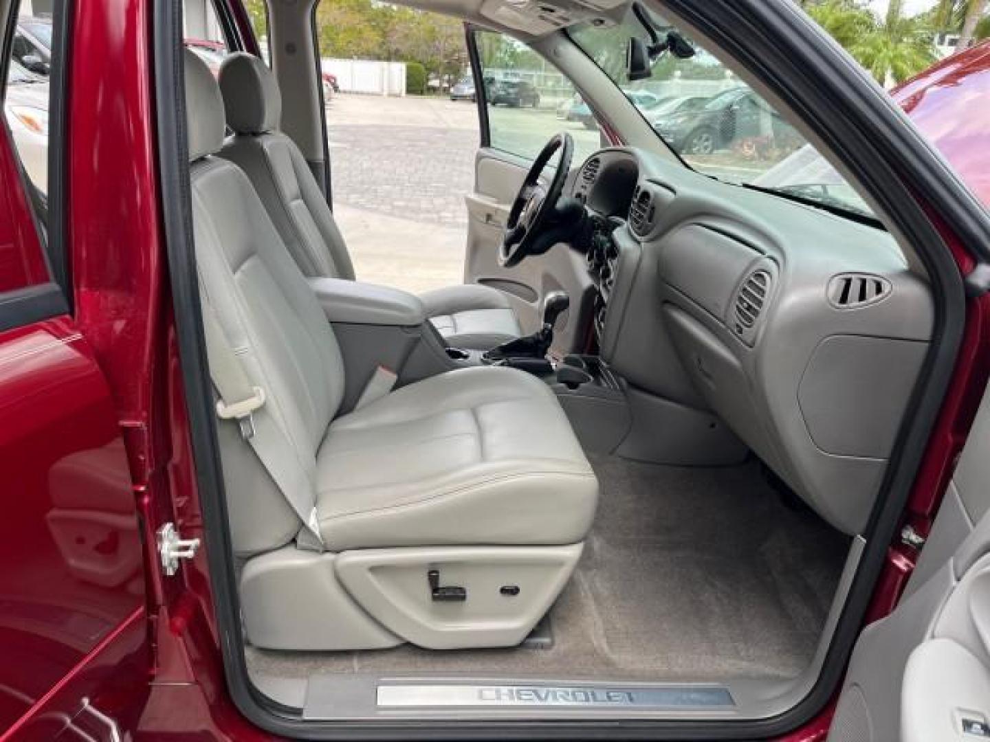 2008 Red Jewel Tintcoat /Light gray/dark gray Chevrolet TrailBlazer LT w/2LT LOW MILES 29,387 (1GNDS13S982) with an 4.2L Vortec 1000 I6 SFI Engine engine, Automatic transmission, located at 4701 North Dixie Hwy, Pompano Beach, FL, 33064, (954) 422-2889, 26.240938, -80.123474 - 2008 CHEVROLET TRAILBLAZER LS FLEET2 ROAD READY 4.2L I6 VIN: 1GNDS13S982251928 NO ACCIDENTS 4 DOOR WAGON/SPORT UTILITY SUNROOF NO RECALLS 4.2L I6 F VERY CLEAN FLORIDA OWNER GASOLINE DUAL ZONE AC LOW MILES 29,387 REAR WHEEL DRIVE 12 SERVICE RECORDS POWER LEATHER SEATS 4X2 Anti-Theft System Black Roof - Photo#12