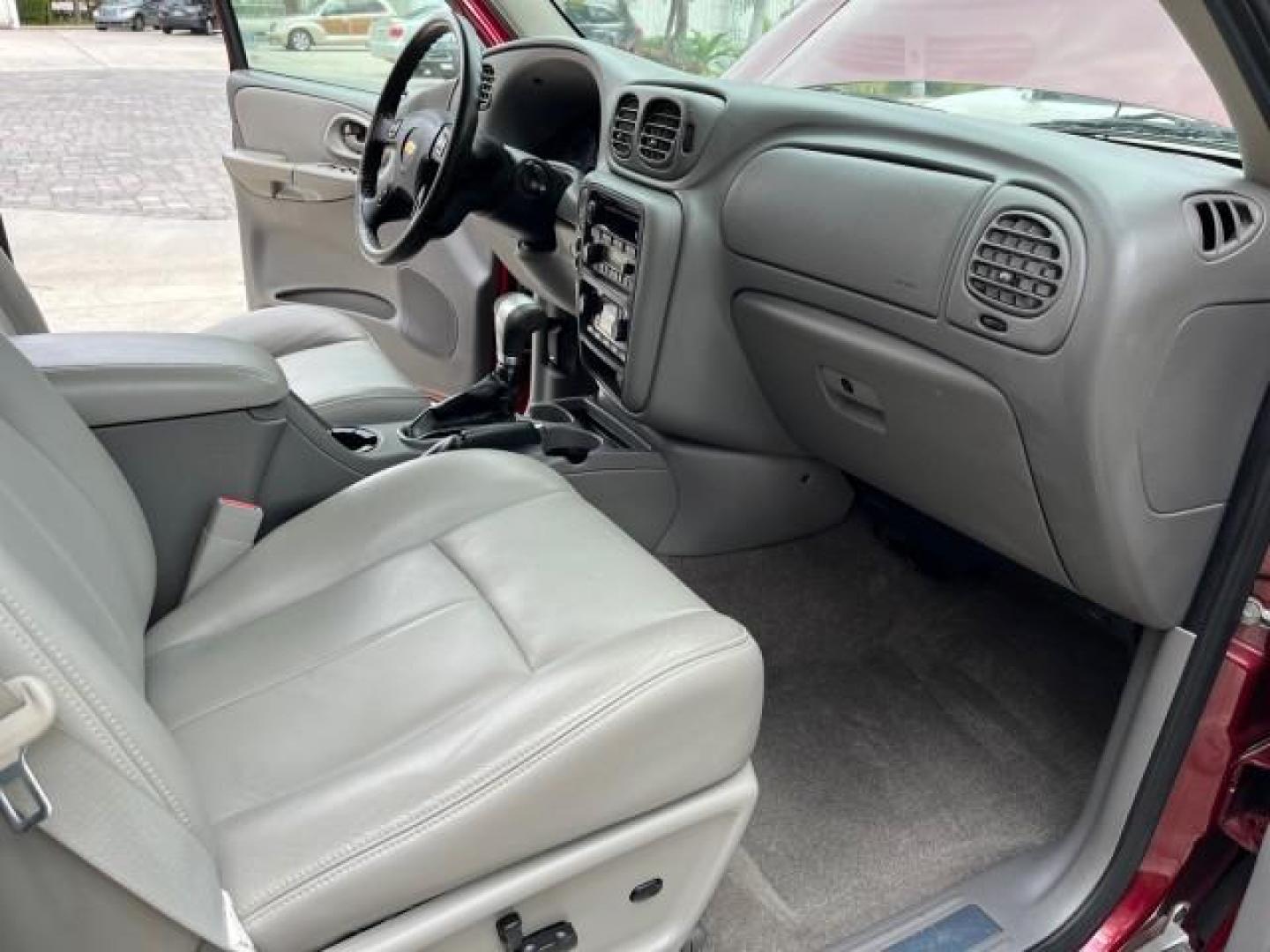 2008 Red Jewel Tintcoat /Light gray/dark gray Chevrolet TrailBlazer LT w/2LT LOW MILES 29,387 (1GNDS13S982) with an 4.2L Vortec 1000 I6 SFI Engine engine, Automatic transmission, located at 4701 North Dixie Hwy, Pompano Beach, FL, 33064, (954) 422-2889, 26.240938, -80.123474 - 2008 CHEVROLET TRAILBLAZER LS FLEET2 ROAD READY 4.2L I6 VIN: 1GNDS13S982251928 NO ACCIDENTS 4 DOOR WAGON/SPORT UTILITY SUNROOF NO RECALLS 4.2L I6 F VERY CLEAN FLORIDA OWNER GASOLINE DUAL ZONE AC LOW MILES 29,387 REAR WHEEL DRIVE 12 SERVICE RECORDS POWER LEATHER SEATS 4X2 Anti-Theft System Black Roof - Photo#27