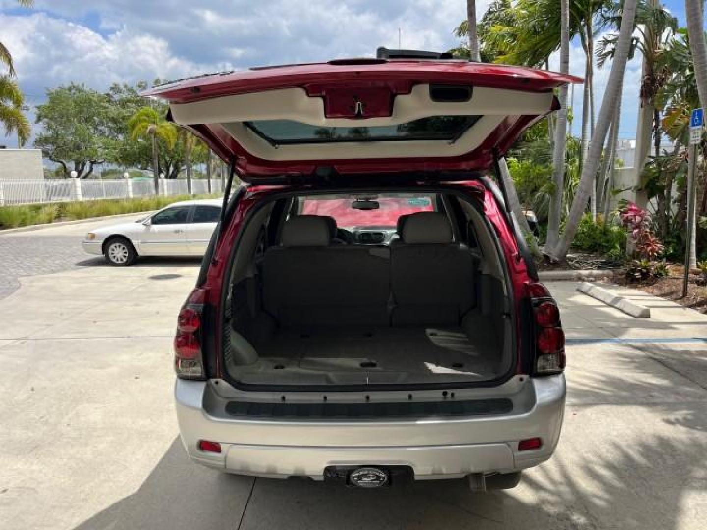 2008 Red Jewel Tintcoat /Light gray/dark gray Chevrolet TrailBlazer LT w/2LT LOW MILES 29,387 (1GNDS13S982) with an 4.2L Vortec 1000 I6 SFI Engine engine, Automatic transmission, located at 4701 North Dixie Hwy, Pompano Beach, FL, 33064, (954) 422-2889, 26.240938, -80.123474 - 2008 CHEVROLET TRAILBLAZER LS FLEET2 ROAD READY 4.2L I6 VIN: 1GNDS13S982251928 NO ACCIDENTS 4 DOOR WAGON/SPORT UTILITY SUNROOF NO RECALLS 4.2L I6 F VERY CLEAN FLORIDA OWNER GASOLINE DUAL ZONE AC LOW MILES 29,387 REAR WHEEL DRIVE 12 SERVICE RECORDS POWER LEATHER SEATS 4X2 Anti-Theft System Black Roof - Photo#64