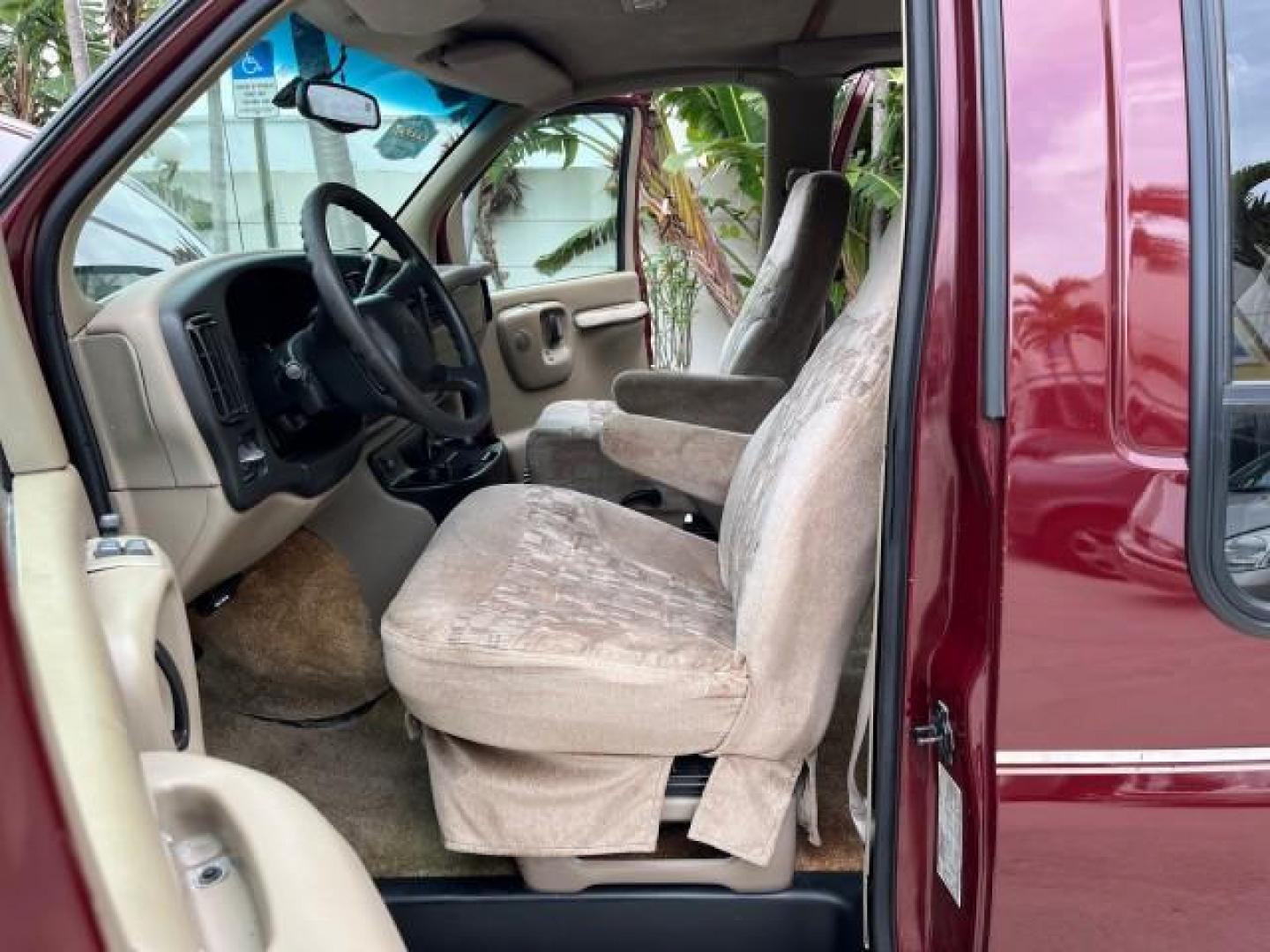 2002 Dark Carmine Red Metallic /Neutral Chevrolet Express Van CONVERSION LOW MILES 94,100 (1GBFG15W621) with an 4.3L Vortec 4300 SFI V6 Gas Engine engine, Automatic transmission, located at 4701 North Dixie Hwy, Pompano Beach, FL, 33064, (954) 422-2889, 26.240938, -80.123474 - 2002 CHEVROLET EXPRESS G1500 ROAD READY 4.3L V6 VIN: 1GBFG15W621192339 NO ACCIDENTS VAN NO RECALLS 4.3L V6 F OHV 12V FLORIDA OWNER GASOLINE LOW MILES 94,100 REAR WHEEL DRIVE THIS IS ONE OF THE NICEST CHEVROLET EXPRESS WE HAVE EVER LISTED RETIRE FLORIDA TITLE THIS IS THE LOWEST MILE FOR THE YEAR WITH - Photo#10