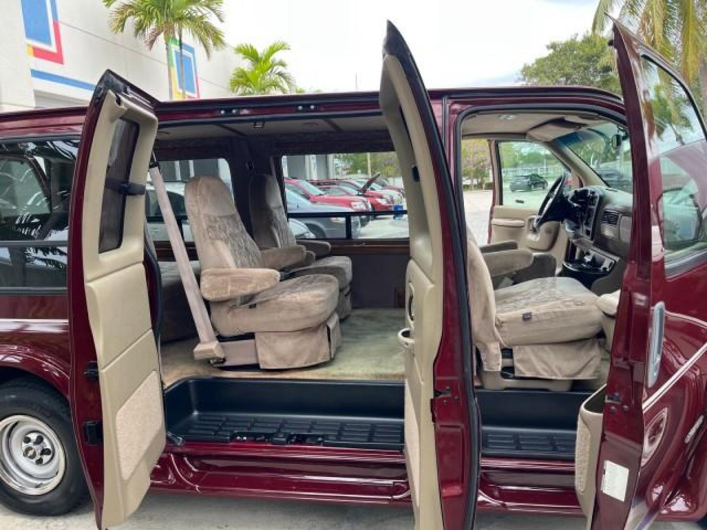 2002 Dark Carmine Red Metallic /Neutral Chevrolet Express Van CONVERSION LOW MILES 94,100 (1GBFG15W621) with an 4.3L Vortec 4300 SFI V6 Gas Engine engine, Automatic transmission, located at 4701 North Dixie Hwy, Pompano Beach, FL, 33064, (954) 422-2889, 26.240938, -80.123474 - 2002 CHEVROLET EXPRESS G1500 ROAD READY 4.3L V6 VIN: 1GBFG15W621192339 NO ACCIDENTS VAN NO RECALLS 4.3L V6 F OHV 12V FLORIDA OWNER GASOLINE LOW MILES 94,100 REAR WHEEL DRIVE THIS IS ONE OF THE NICEST CHEVROLET EXPRESS WE HAVE EVER LISTED RETIRE FLORIDA TITLE THIS IS THE LOWEST MILE FOR THE YEAR WITH - Photo#13