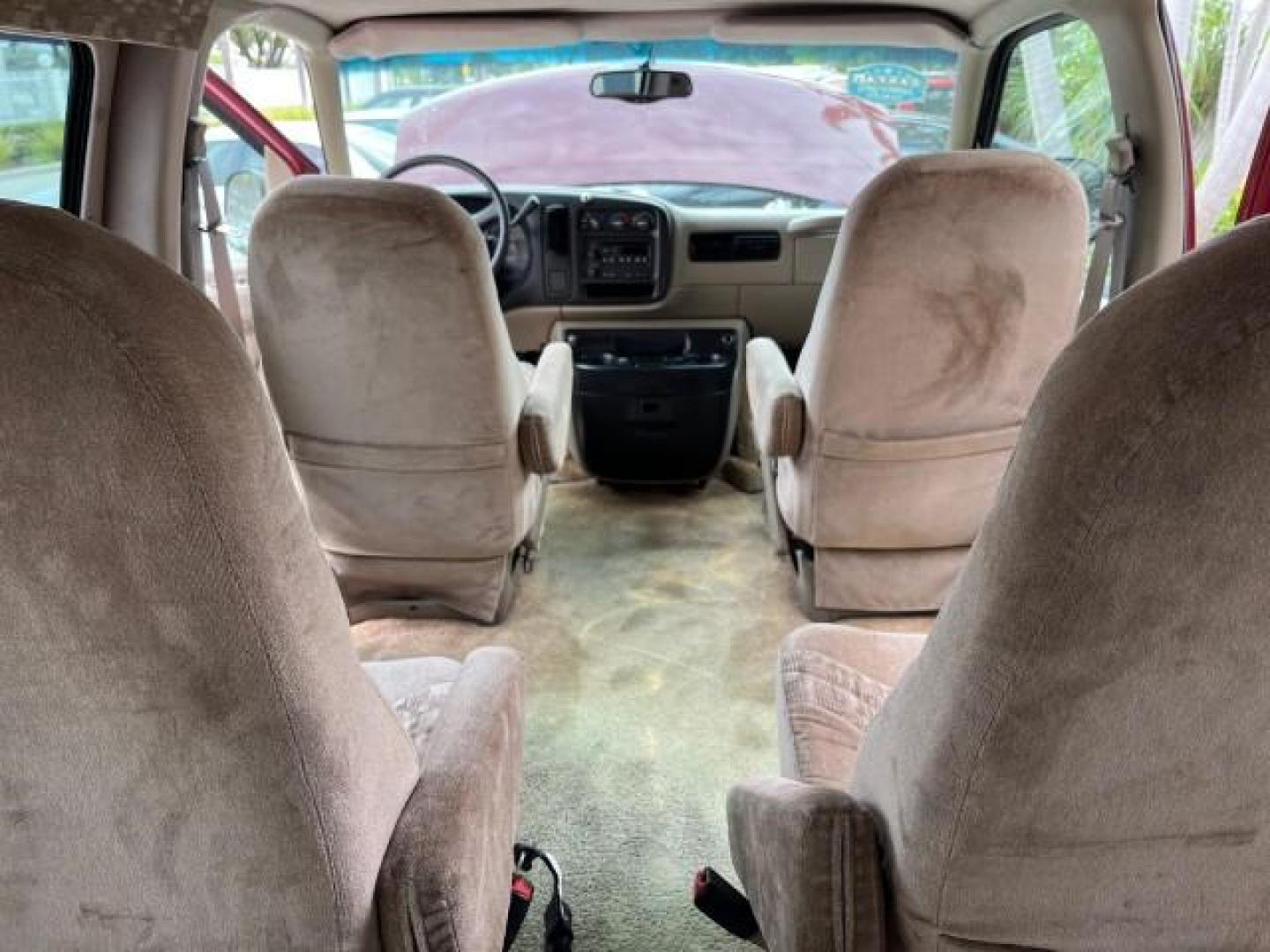 2002 Dark Carmine Red Metallic /Neutral Chevrolet Express Van CONVERSION LOW MILES 94,100 (1GBFG15W621) with an 4.3L Vortec 4300 SFI V6 Gas Engine engine, Automatic transmission, located at 4701 North Dixie Hwy, Pompano Beach, FL, 33064, (954) 422-2889, 26.240938, -80.123474 - 2002 CHEVROLET EXPRESS G1500 ROAD READY 4.3L V6 VIN: 1GBFG15W621192339 NO ACCIDENTS VAN NO RECALLS 4.3L V6 F OHV 12V FLORIDA OWNER GASOLINE LOW MILES 94,100 REAR WHEEL DRIVE THIS IS ONE OF THE NICEST CHEVROLET EXPRESS WE HAVE EVER LISTED RETIRE FLORIDA TITLE THIS IS THE LOWEST MILE FOR THE YEAR WITH - Photo#42