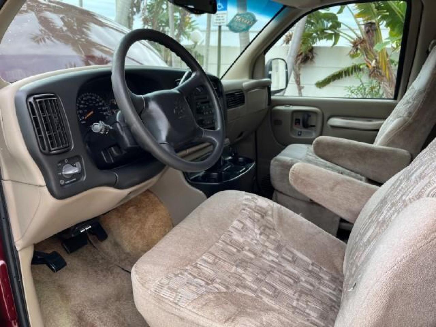 2002 Dark Carmine Red Metallic /Neutral Chevrolet Express Van CONVERSION LOW MILES 94,100 (1GBFG15W621) with an 4.3L Vortec 4300 SFI V6 Gas Engine engine, Automatic transmission, located at 4701 North Dixie Hwy, Pompano Beach, FL, 33064, (954) 422-2889, 26.240938, -80.123474 - 2002 CHEVROLET EXPRESS G1500 ROAD READY 4.3L V6 VIN: 1GBFG15W621192339 NO ACCIDENTS VAN NO RECALLS 4.3L V6 F OHV 12V FLORIDA OWNER GASOLINE LOW MILES 94,100 REAR WHEEL DRIVE THIS IS ONE OF THE NICEST CHEVROLET EXPRESS WE HAVE EVER LISTED RETIRE FLORIDA TITLE THIS IS THE LOWEST MILE FOR THE YEAR WITH - Photo#56