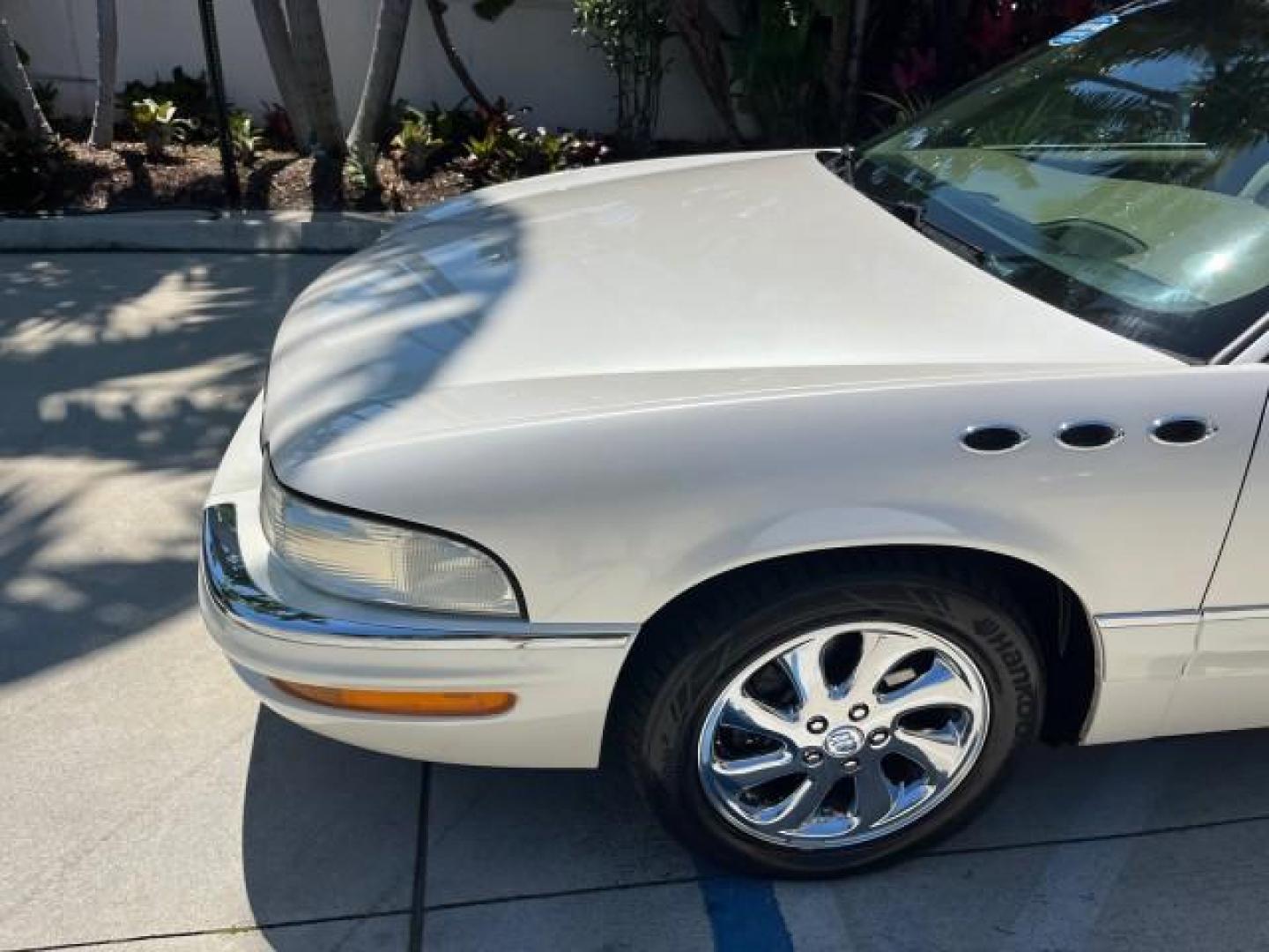 2004 White Diamond /Light Cashmere Buick Park Avenue Ultra LOW MILES 65,064 (1G4CU541544) with an 3.8L 3800 V6 SFI Supercharged Engine engine, Automatic transmission, located at 4701 North Dixie Hwy, Pompano Beach, FL, 33064, (954) 422-2889, 26.240938, -80.123474 - 2004 BUICK PARK AVENUE ULTRA NEW $42,890 ROAD READY VIN: 1G4CU541544134000 BACK UP SENSORS NO ACCIDENTS NO RECALLS SEDAN 4 DR SUPERCHAEGED LOW MILES 65,064 3.8L V6 3.8L V6 F HEADS UP DISPLAY FLORIDA OWNER 28 MPG GASOLINE HEATED SEATS/MIRRORS 35 SERVICE RECORDS FRONT WHEEL DRIVE POWER LEATHER SEATS D - Photo#80