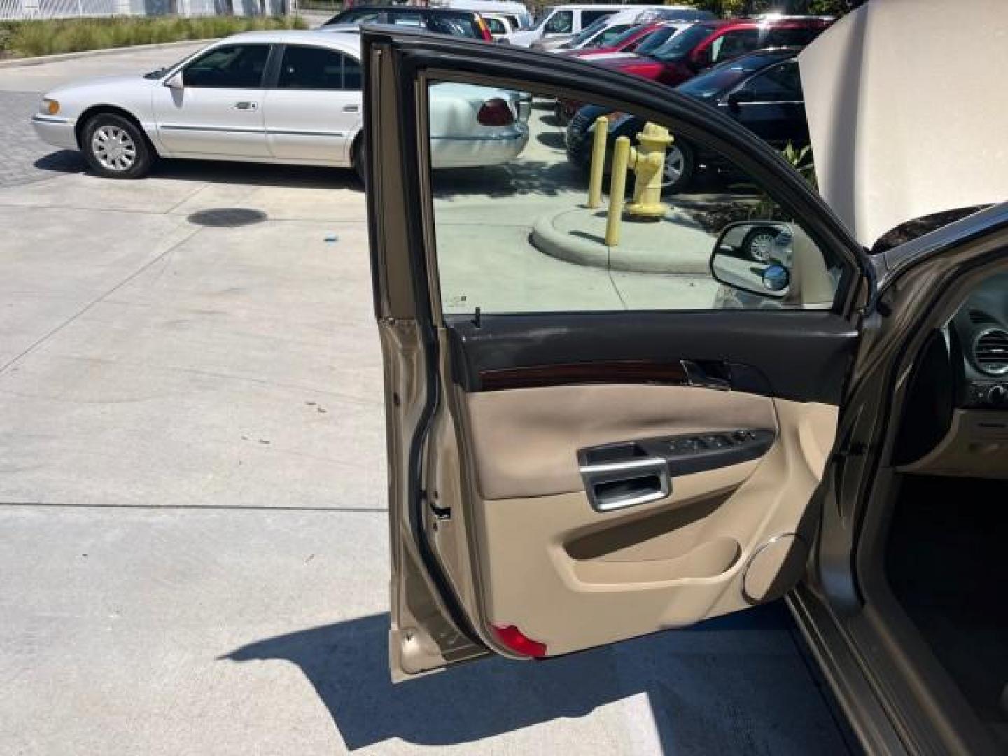 2008 Golden Cashmere /Tan Saturn VUE 1 FL XR AWD LOW MILES 82,013 (3GSDL73718S) with an 3.6L V6 SFI Engine engine, Automatic transmission, located at 4701 North Dixie Hwy, Pompano Beach, FL, 33064, (954) 422-2889, 26.240938, -80.123474 - 2008 SATURN VUE XR AWD NEW$32,900 ROAD READY VIN: 3GSDL73718S528732 NO ACCIDENTS NO RECALLS 4 DOOR WAGON/SPORT UTILITY 1 OWNER FLORIDA OWNER 3.6L V6 F POWER SEATS/MIRRORS GASOLINE 17 SERVICE RECORDS ON DEMAND AWD 3.6L V6 ALL WHEEL DRIVE LOW MILES 82,013 NAVIGATION AWD SUNROOF AWD Anti-Theft System A - Photo#9