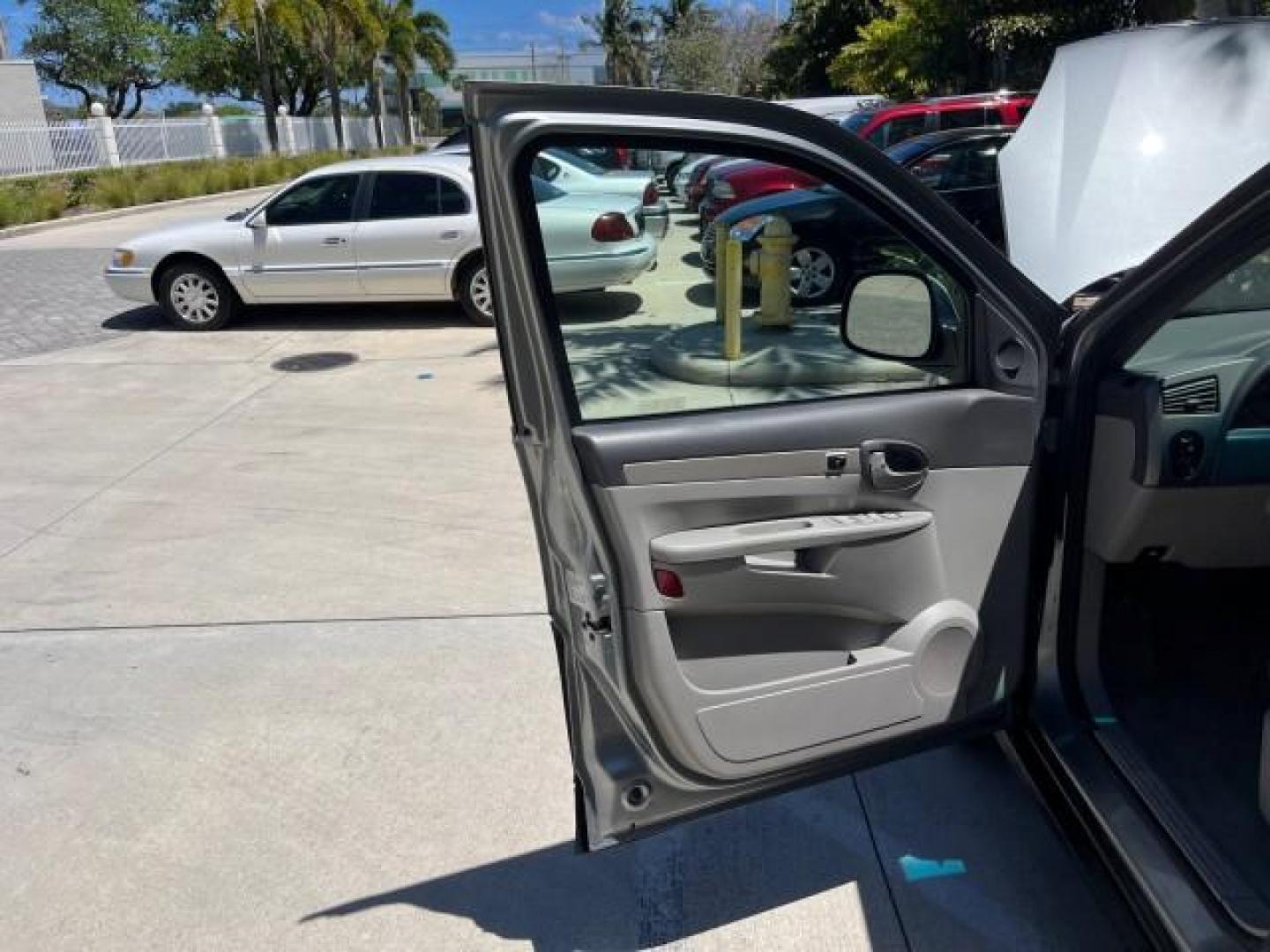 2004 Light Spiral Gray Metallic /Light Gray Buick Rendezvous 1 FL LOW MILES 63,783 (3G5DA03E54S) with an 3.4L 3400 V6 SFI Engine engine, Automatic transmission, located at 4701 North Dixie Hwy, Pompano Beach, FL, 33064, (954) 422-2889, 26.240938, -80.123474 - OUR WEBPAGE FLORIDACARS1.COM HAS OVER 100 PHOTOS AND FREE CARFAX LINK 2004 BUICK RENDEZVOUS CX ROAD READY 3.4L V6 VIN: 3G5DA03E54S557918 NO ACCIDENTS 26 MPG 4 DOOR WAGON NO RECALLS 3.4L V6 F 1 OWNER FLORIDA GASOLINE LOW MILES 63,783 FRONT WHEEL DRIVE 11 SERVICE RECORDS Anti-Theft System Approach Lig - Photo#9