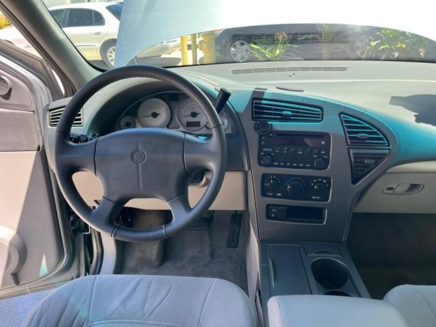 2004 Light Spiral Gray Metallic /Light Gray Buick Rendezvous 1 FL LOW MILES 63,783 (3G5DA03E54S) with an 3.4L 3400 V6 SFI Engine engine, Automatic transmission, located at 4701 North Dixie Hwy, Pompano Beach, FL, 33064, (954) 422-2889, 26.240938, -80.123474 - OUR WEBPAGE FLORIDACARS1.COM HAS OVER 100 PHOTOS AND FREE CARFAX LINK 2004 BUICK RENDEZVOUS CX ROAD READY 3.4L V6 VIN: 3G5DA03E54S557918 NO ACCIDENTS 26 MPG 4 DOOR WAGON NO RECALLS 3.4L V6 F 1 OWNER FLORIDA GASOLINE LOW MILES 63,783 FRONT WHEEL DRIVE 11 SERVICE RECORDS Anti-Theft System Approach Lig - Photo#36