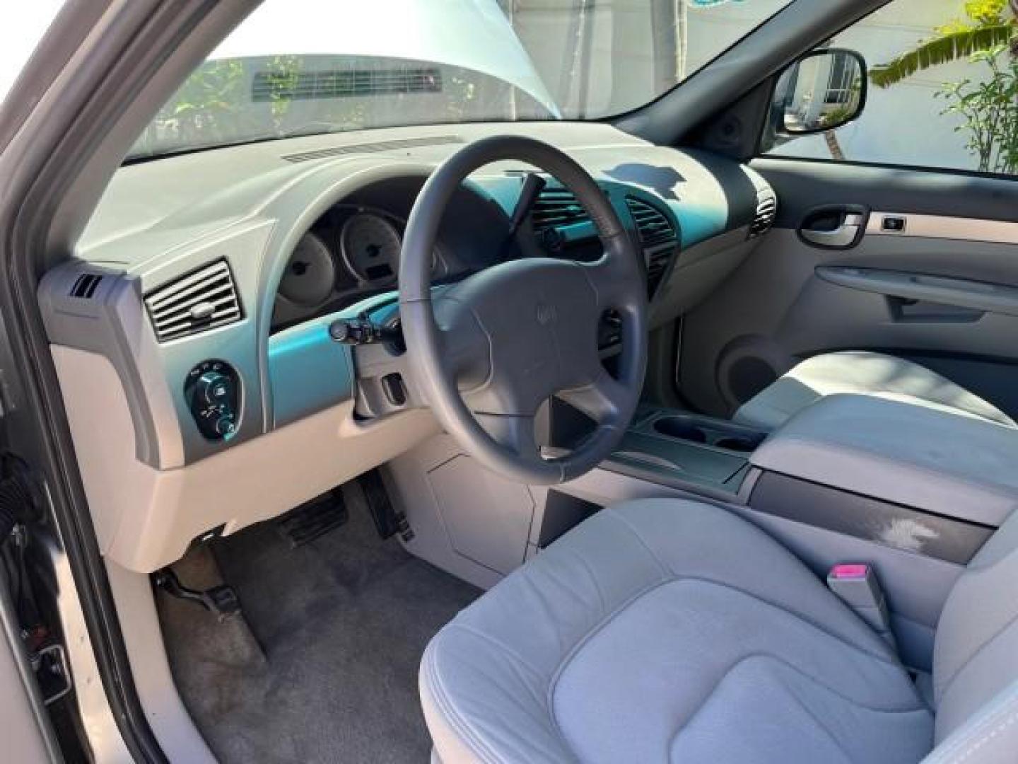 2004 Light Spiral Gray Metallic /Light Gray Buick Rendezvous 1 FL LOW MILES 63,783 (3G5DA03E54S) with an 3.4L 3400 V6 SFI Engine engine, Automatic transmission, located at 4701 North Dixie Hwy, Pompano Beach, FL, 33064, (954) 422-2889, 26.240938, -80.123474 - OUR WEBPAGE FLORIDACARS1.COM HAS OVER 100 PHOTOS AND FREE CARFAX LINK 2004 BUICK RENDEZVOUS CX ROAD READY 3.4L V6 VIN: 3G5DA03E54S557918 NO ACCIDENTS 26 MPG 4 DOOR WAGON NO RECALLS 3.4L V6 F 1 OWNER FLORIDA GASOLINE LOW MILES 63,783 FRONT WHEEL DRIVE 11 SERVICE RECORDS Anti-Theft System Approach Lig - Photo#43