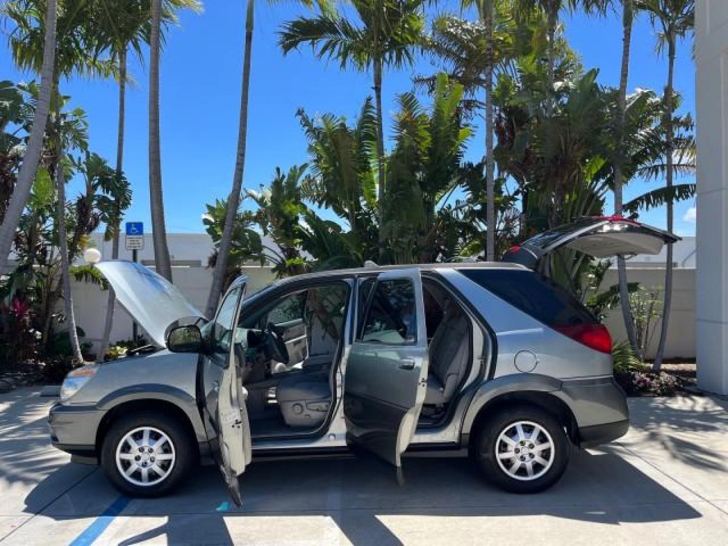 2004 Light Spiral Gray Metallic /Light Gray Buick Rendezvous 1 FL LOW MILES 63,783 (3G5DA03E54S) with an 3.4L 3400 V6 SFI Engine engine, Automatic transmission, located at 4701 North Dixie Hwy, Pompano Beach, FL, 33064, (954) 422-2889, 26.240938, -80.123474 - OUR WEBPAGE FLORIDACARS1.COM HAS OVER 100 PHOTOS AND FREE CARFAX LINK 2004 BUICK RENDEZVOUS CX ROAD READY 3.4L V6 VIN: 3G5DA03E54S557918 NO ACCIDENTS 26 MPG 4 DOOR WAGON NO RECALLS 3.4L V6 F 1 OWNER FLORIDA GASOLINE LOW MILES 63,783 FRONT WHEEL DRIVE 11 SERVICE RECORDS Anti-Theft System Approach Lig - Photo#8