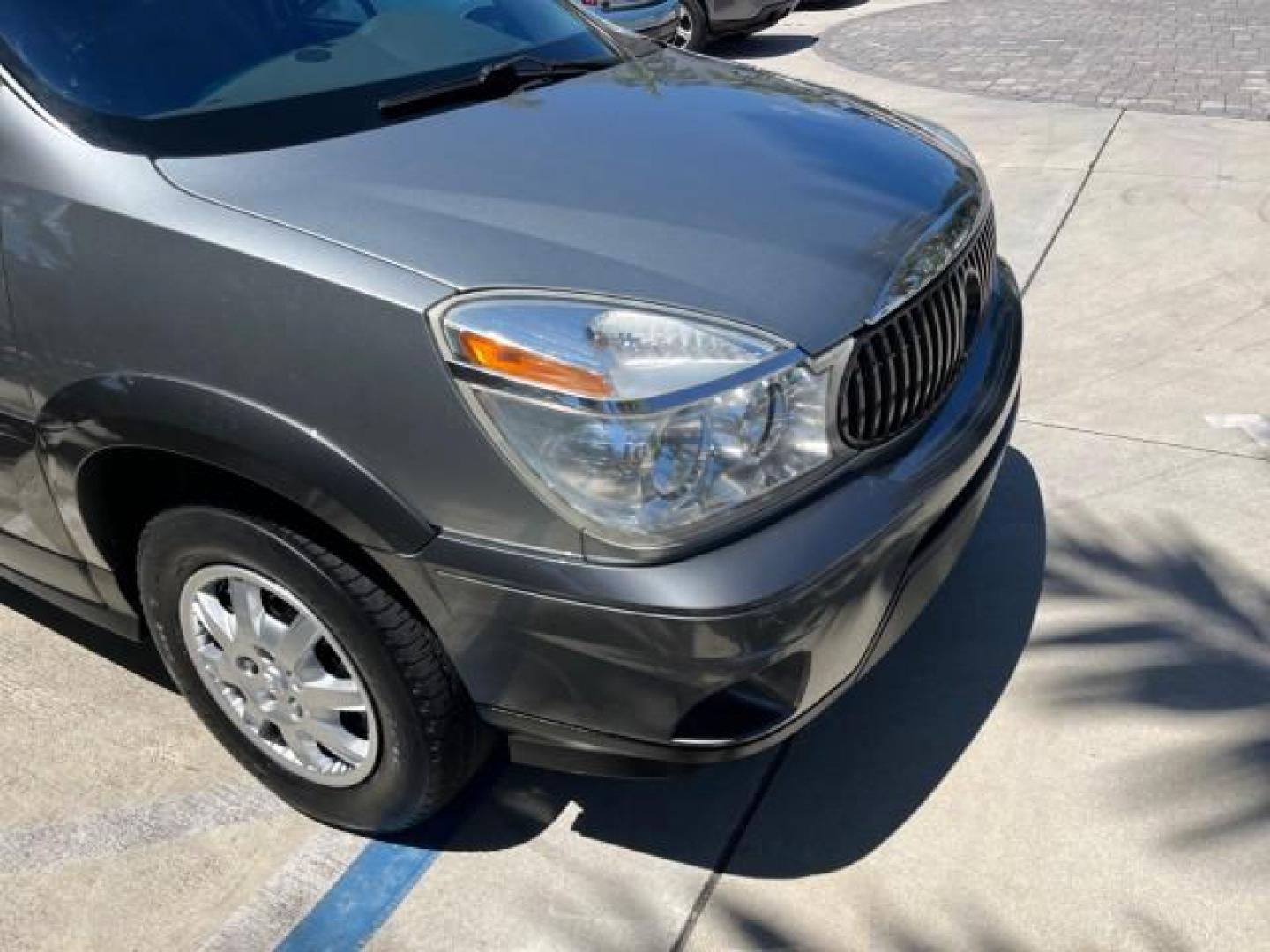 2004 Light Spiral Gray Metallic /Light Gray Buick Rendezvous 1 FL LOW MILES 63,783 (3G5DA03E54S) with an 3.4L 3400 V6 SFI Engine engine, Automatic transmission, located at 4701 North Dixie Hwy, Pompano Beach, FL, 33064, (954) 422-2889, 26.240938, -80.123474 - OUR WEBPAGE FLORIDACARS1.COM HAS OVER 100 PHOTOS AND FREE CARFAX LINK 2004 BUICK RENDEZVOUS CX ROAD READY 3.4L V6 VIN: 3G5DA03E54S557918 NO ACCIDENTS 26 MPG 4 DOOR WAGON NO RECALLS 3.4L V6 F 1 OWNER FLORIDA GASOLINE LOW MILES 63,783 FRONT WHEEL DRIVE 11 SERVICE RECORDS Anti-Theft System Approach Lig - Photo#89