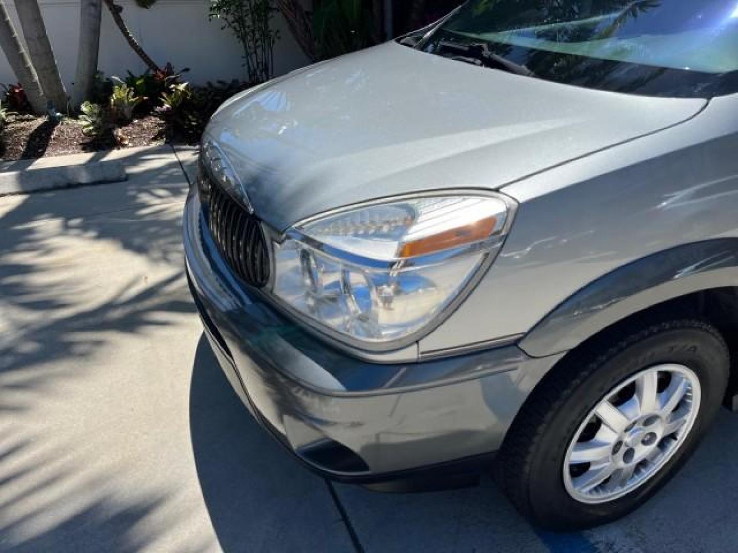 2004 Light Spiral Gray Metallic /Light Gray Buick Rendezvous 1 FL LOW MILES 63,783 (3G5DA03E54S) with an 3.4L 3400 V6 SFI Engine engine, Automatic transmission, located at 4701 North Dixie Hwy, Pompano Beach, FL, 33064, (954) 422-2889, 26.240938, -80.123474 - OUR WEBPAGE FLORIDACARS1.COM HAS OVER 100 PHOTOS AND FREE CARFAX LINK 2004 BUICK RENDEZVOUS CX ROAD READY 3.4L V6 VIN: 3G5DA03E54S557918 NO ACCIDENTS 26 MPG 4 DOOR WAGON NO RECALLS 3.4L V6 F 1 OWNER FLORIDA GASOLINE LOW MILES 63,783 FRONT WHEEL DRIVE 11 SERVICE RECORDS Anti-Theft System Approach Lig - Photo#90