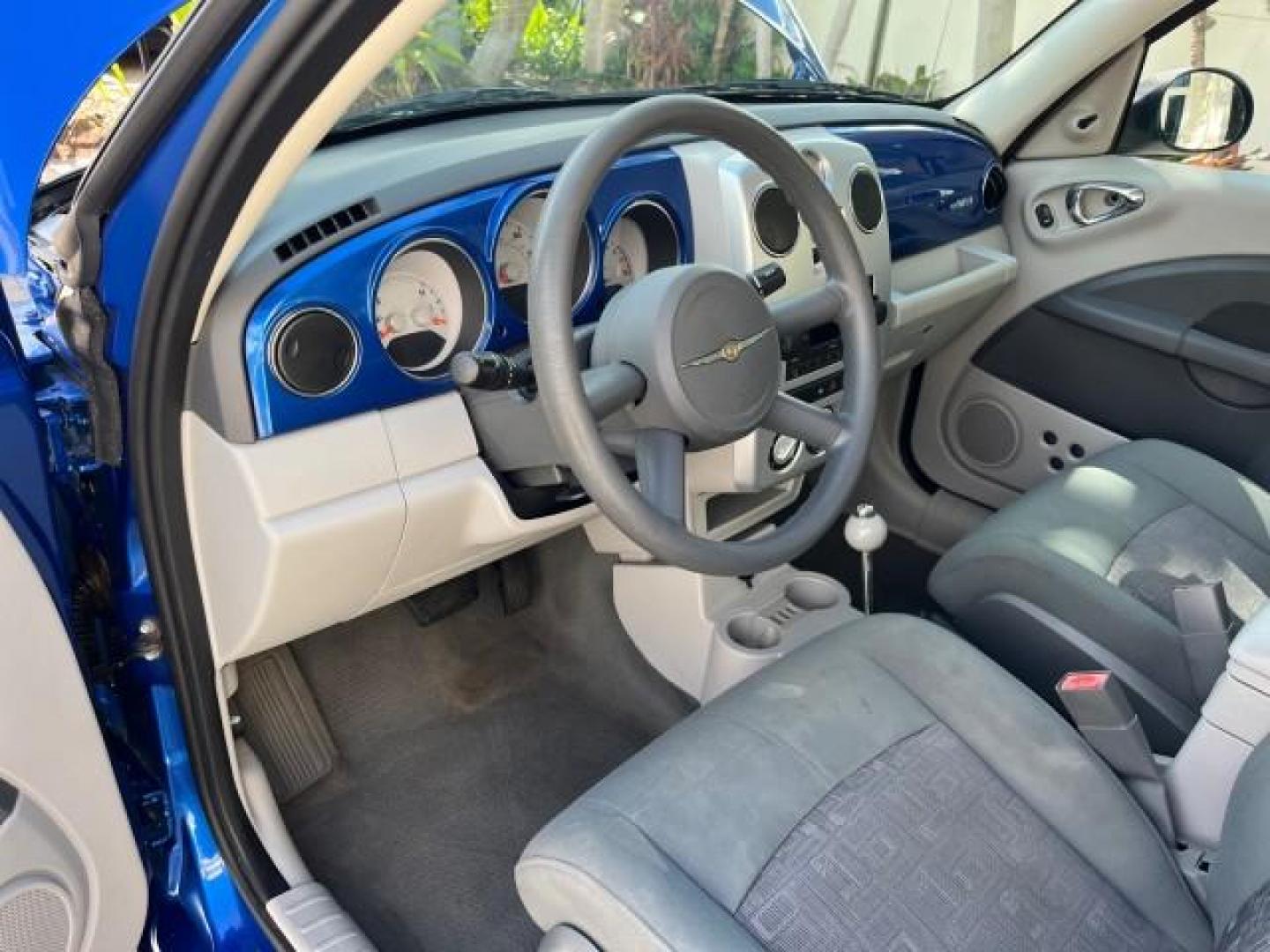 2006 Electric Blue Pearl /Pastel Slate Gray Chrysler PT Cruiser 1 FL LOW MILES 50,556 (3A4FY48B06T) with an 2.4L DOHC SMPI 16-Valve I4 Engine engine, Automatic transmission, located at 4701 North Dixie Hwy, Pompano Beach, FL, 33064, (954) 422-2889, 26.240938, -80.123474 - OUR WEBPAGE FLORIDACARS1.COM HAS OVER 100 PHOTOS AND FREE CARFAX LINK 2006 CHRYSLER PT CRUISER ROAD READY 2.4L I4 VIN: 3A4FY48B06T339444 NO RECALLS 29 MPG VAN 1 OWNER FLORIDA 2.4L I4 F DOHC 16V LOW MILES 50,556 GASOLINE 12 SERVICE RECORDS FRONT WHEEL DRIVE Additional Airbags Anti-Theft System FWD Fr - Photo#42