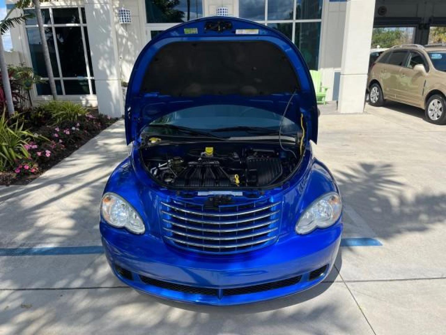 2006 Electric Blue Pearl /Pastel Slate Gray Chrysler PT Cruiser 1 FL LOW MILES 50,556 (3A4FY48B06T) with an 2.4L DOHC SMPI 16-Valve I4 Engine engine, Automatic transmission, located at 4701 North Dixie Hwy, Pompano Beach, FL, 33064, (954) 422-2889, 26.240938, -80.123474 - OUR WEBPAGE FLORIDACARS1.COM HAS OVER 100 PHOTOS AND FREE CARFAX LINK 2006 CHRYSLER PT CRUISER ROAD READY 2.4L I4 VIN: 3A4FY48B06T339444 NO RECALLS 29 MPG VAN 1 OWNER FLORIDA 2.4L I4 F DOHC 16V LOW MILES 50,556 GASOLINE 12 SERVICE RECORDS FRONT WHEEL DRIVE Additional Airbags Anti-Theft System FWD Fr - Photo#68