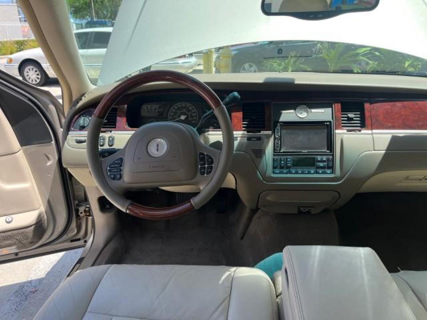 2003 Lt Parchment Gold Metallic /Light Parchment Lincoln Town Car Signature Premium LOW MILES 66,012 (1LNHM82W83Y) with an 4.6L SOHC SMPI V8 Engine engine, Automatic transmission, located at 4701 North Dixie Hwy, Pompano Beach, FL, 33064, (954) 422-2889, 26.240938, -80.123474 - 2003 LINCOLN TOWN CAR SIGNATURE NEW $43,245 ROAD READY VIN: 1LNHM82W83Y634911 LOW MILES 66,012 4.6L V8 SEDAN 4 DR NO RECALLS 25 MPG 4.6L V8 F OHV POWER LEATHER SEATS GASOLINE PARKING SENSORS REAR WHEEL DRIVE SIGNATURE DUAL ZONE AC FLORIDA OWNER Air Suspension Alloy Wheels Anti-Theft System Approach - Photo#34