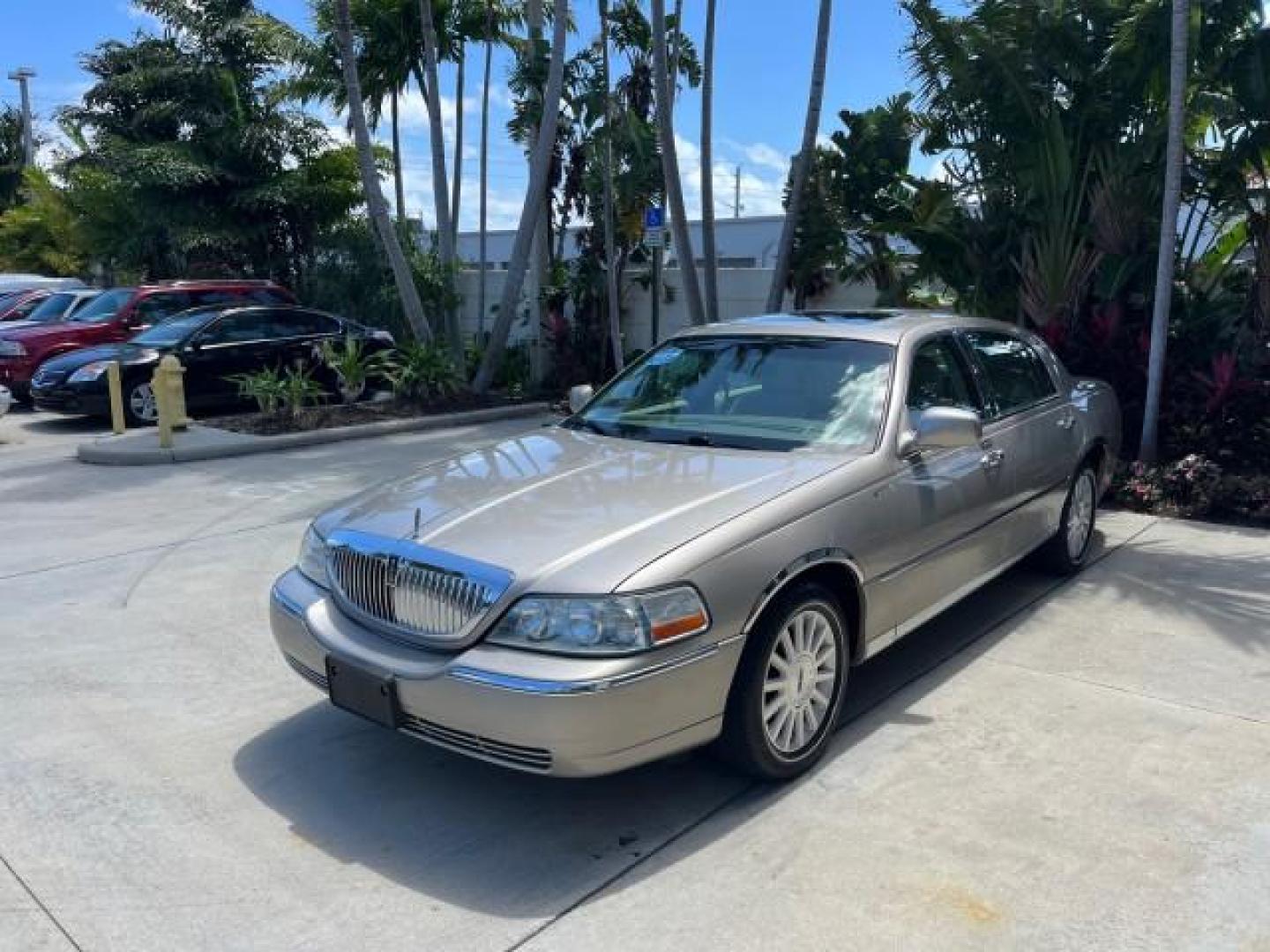 2003 Lt Parchment Gold Metallic /Light Parchment Lincoln Town Car Signature Premium LOW MILES 66,012 (1LNHM82W83Y) with an 4.6L SOHC SMPI V8 Engine engine, Automatic transmission, located at 4701 North Dixie Hwy, Pompano Beach, FL, 33064, (954) 422-2889, 26.240938, -80.123474 - 2003 LINCOLN TOWN CAR SIGNATURE NEW $43,245 ROAD READY VIN: 1LNHM82W83Y634911 LOW MILES 66,012 4.6L V8 SEDAN 4 DR NO RECALLS 25 MPG 4.6L V8 F OHV POWER LEATHER SEATS GASOLINE PARKING SENSORS REAR WHEEL DRIVE SIGNATURE DUAL ZONE AC FLORIDA OWNER Air Suspension Alloy Wheels Anti-Theft System Approach - Photo#3