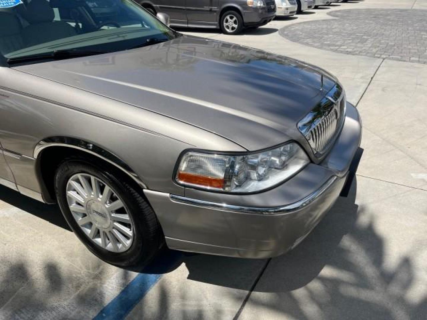 2003 Lt Parchment Gold Metallic /Light Parchment Lincoln Town Car Signature Premium LOW MILES 66,012 (1LNHM82W83Y) with an 4.6L SOHC SMPI V8 Engine engine, Automatic transmission, located at 4701 North Dixie Hwy, Pompano Beach, FL, 33064, (954) 422-2889, 26.240938, -80.123474 - 2003 LINCOLN TOWN CAR SIGNATURE NEW $43,245 ROAD READY VIN: 1LNHM82W83Y634911 LOW MILES 66,012 4.6L V8 SEDAN 4 DR NO RECALLS 25 MPG 4.6L V8 F OHV POWER LEATHER SEATS GASOLINE PARKING SENSORS REAR WHEEL DRIVE SIGNATURE DUAL ZONE AC FLORIDA OWNER Air Suspension Alloy Wheels Anti-Theft System Approach - Photo#78