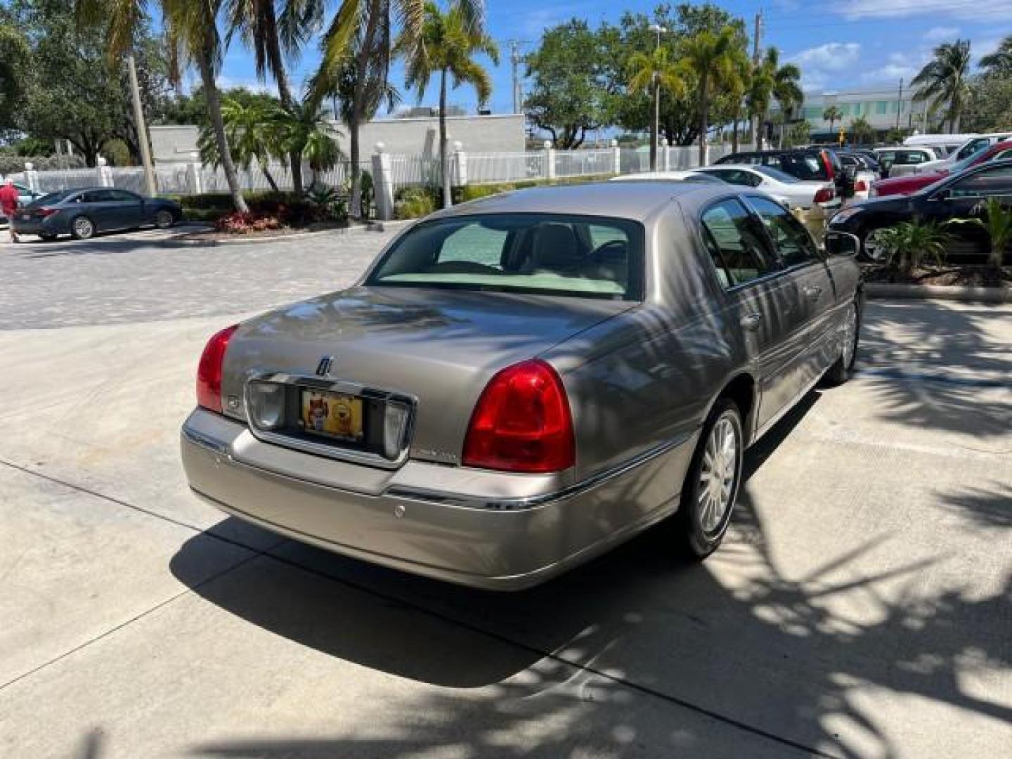 2003 Lt Parchment Gold Metallic /Light Parchment Lincoln Town Car Signature Premium LOW MILES 66,012 (1LNHM82W83Y) with an 4.6L SOHC SMPI V8 Engine engine, Automatic transmission, located at 4701 North Dixie Hwy, Pompano Beach, FL, 33064, (954) 422-2889, 26.240938, -80.123474 - 2003 LINCOLN TOWN CAR SIGNATURE NEW $43,245 ROAD READY VIN: 1LNHM82W83Y634911 LOW MILES 66,012 4.6L V8 SEDAN 4 DR NO RECALLS 25 MPG 4.6L V8 F OHV POWER LEATHER SEATS GASOLINE PARKING SENSORS REAR WHEEL DRIVE SIGNATURE DUAL ZONE AC FLORIDA OWNER Air Suspension Alloy Wheels Anti-Theft System Approach - Photo#7