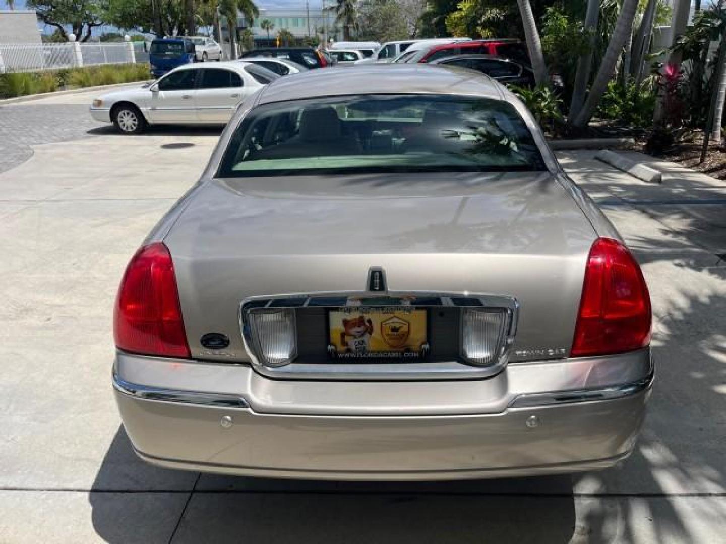 2003 Lt Parchment Gold Metallic /Light Parchment Lincoln Town Car Signature Premium LOW MILES 66,012 (1LNHM82W83Y) with an 4.6L SOHC SMPI V8 Engine engine, Automatic transmission, located at 4701 North Dixie Hwy, Pompano Beach, FL, 33064, (954) 422-2889, 26.240938, -80.123474 - 2003 LINCOLN TOWN CAR SIGNATURE NEW $43,245 ROAD READY VIN: 1LNHM82W83Y634911 LOW MILES 66,012 4.6L V8 SEDAN 4 DR NO RECALLS 25 MPG 4.6L V8 F OHV POWER LEATHER SEATS GASOLINE PARKING SENSORS REAR WHEEL DRIVE SIGNATURE DUAL ZONE AC FLORIDA OWNER Air Suspension Alloy Wheels Anti-Theft System Approach - Photo#90