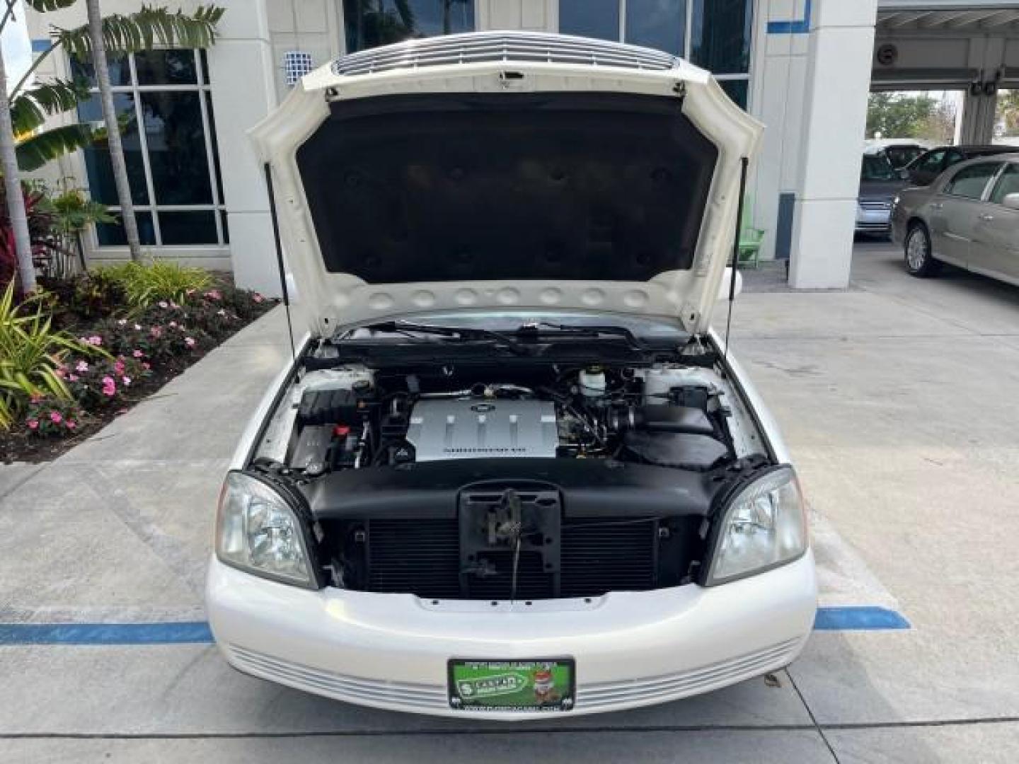 2005 White Lightning /Shale Cadillac DeVille LOW MILES 29,071 (1G6KD57Y45U) with an 4.6L DOHC V8 Northstar Engine engine, Automatic transmission, located at 4701 North Dixie Hwy, Pompano Beach, FL, 33064, (954) 422-2889, 26.240938, -80.123474 - 2005 CADILLAC DEVILLE NEW $54,250 ROAD READY VIN: 1G6KD57Y45U238393 NO ACCIDENTS 4.6L V8 SEDAN 4 DR PARK SENSORS NO RECALLS 28 MPG 4.6L V8 F DOHC HEATED AND COOLED SEATS LOW MILES 29,071 GASOLINE 20 SERVICE RECORDS POWER LEATHER SEATS FRONT WHEEL DRIVE DUAL ZONE AC POWER SUNROOF/MIRRORS Air Suspensi - Photo#66