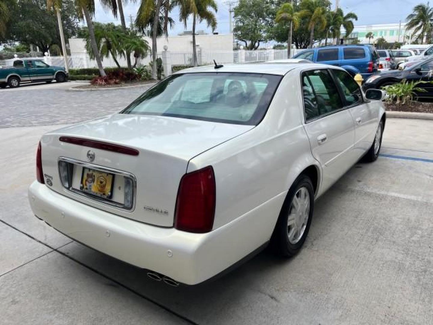 2005 White Lightning /Shale Cadillac DeVille LOW MILES 29,071 (1G6KD57Y45U) with an 4.6L DOHC V8 Northstar Engine engine, Automatic transmission, located at 4701 North Dixie Hwy, Pompano Beach, FL, 33064, (954) 422-2889, 26.240938, -80.123474 - 2005 CADILLAC DEVILLE NEW $54,250 ROAD READY VIN: 1G6KD57Y45U238393 NO ACCIDENTS 4.6L V8 SEDAN 4 DR PARK SENSORS NO RECALLS 28 MPG 4.6L V8 F DOHC HEATED AND COOLED SEATS LOW MILES 29,071 GASOLINE 20 SERVICE RECORDS POWER LEATHER SEATS FRONT WHEEL DRIVE DUAL ZONE AC POWER SUNROOF/MIRRORS Air Suspensi - Photo#93