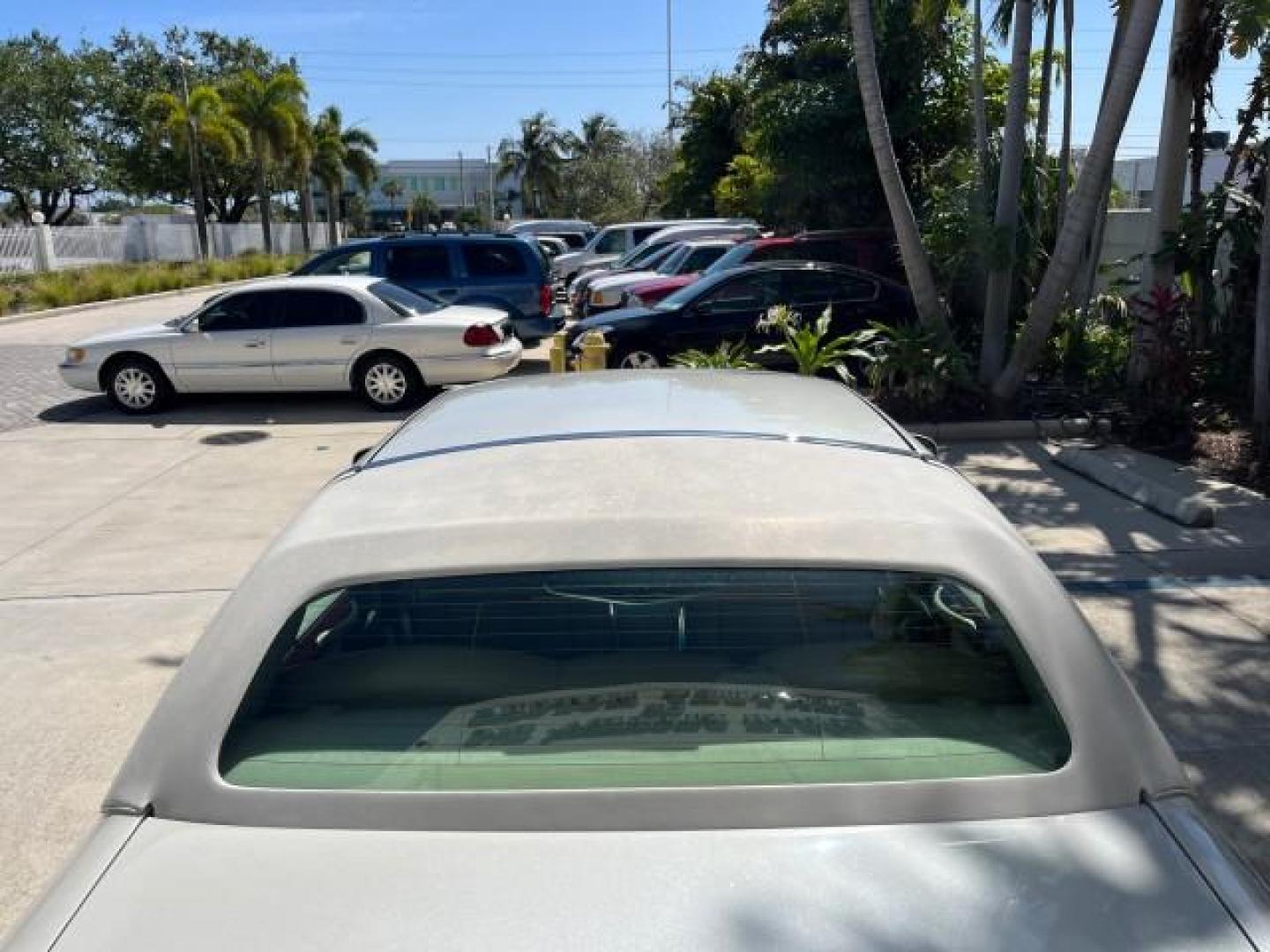 2005 Ceramic White Tri-Coat /Shale/Dove Lincoln Town Car Signature Limited LOW MILES 23,114 (1LNHM82W35Y) with an 4.6L SOHC SMPI V8 Engine engine, Automatic transmission, located at 4701 North Dixie Hwy, Pompano Beach, FL, 33064, (954) 422-2889, 26.240938, -80.123474 - OUR WEBPAGE FLORIDACARS1.COM HAS OVER 100 PHOTOS AND FREE CARFAX LINK 2005 LINCOLN TOWN CAR SIGNATURE LIMITED ROAD READY NEW $42,920 VIN: 1LNHM82W35Y626251 FLORIDA OWNER 4,6L V8 SEDAN 4 DR NO ACCIDENTS 4.6L V8 F OHV 16V POWER LEATHER SEATS GASOLINE LOW MILES 23,114 POWER MIRRORS 25 MPG REAR WHEEL DR - Photo#88