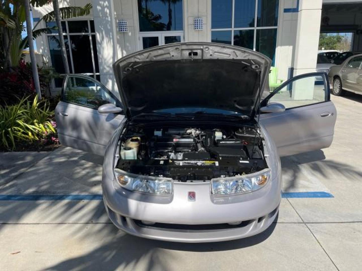 1999 Silver /Grey Saturn SC 3dr LOW MILES 53,616 (1G8ZY1276XZ) with an 1.9L DOHC SPFI 16-Valve L4 Aluminum Engine engine, Automatic transmission, located at 4701 North Dixie Hwy, Pompano Beach, FL, 33064, (954) 422-2889, 26.240938, -80.123474 - 1999 SATURN S-SERIES SC2 ROAD READY 1.9L L4 VIN: 1G8ZY1276XZ371017 NO RECALLS 36 MPG COUPE 3 DR LOW MILES 53,616 1.9L I4 F DOHC 16V 21 SERVICE RECORDS GASOLINE POWER SUNROOF FRONT WHEEL DRIVE POWER MIRRORS THIS IS ONE OF THE NICEST SATURN'S WE HAVE EVER LISTED RETIREE NORTH CAROLINA TITLE THIS IS TH - Photo#15