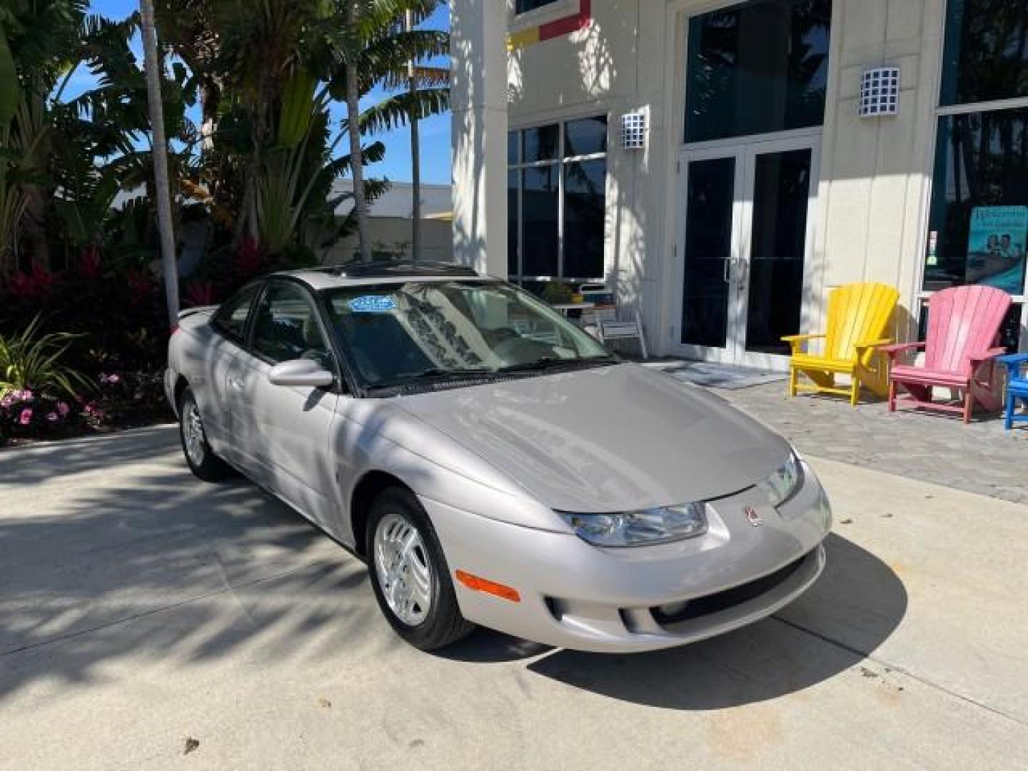 1999 Silver /Grey Saturn SC 3dr LOW MILES 53,616 (1G8ZY1276XZ) with an 1.9L DOHC SPFI 16-Valve L4 Aluminum Engine engine, Automatic transmission, located at 4701 North Dixie Hwy, Pompano Beach, FL, 33064, (954) 422-2889, 26.240938, -80.123474 - 1999 SATURN S-SERIES SC2 ROAD READY 1.9L L4 VIN: 1G8ZY1276XZ371017 NO RECALLS 36 MPG COUPE 3 DR LOW MILES 53,616 1.9L I4 F DOHC 16V 21 SERVICE RECORDS GASOLINE POWER SUNROOF FRONT WHEEL DRIVE POWER MIRRORS THIS IS ONE OF THE NICEST SATURN'S WE HAVE EVER LISTED RETIREE NORTH CAROLINA TITLE THIS IS TH - Photo#1